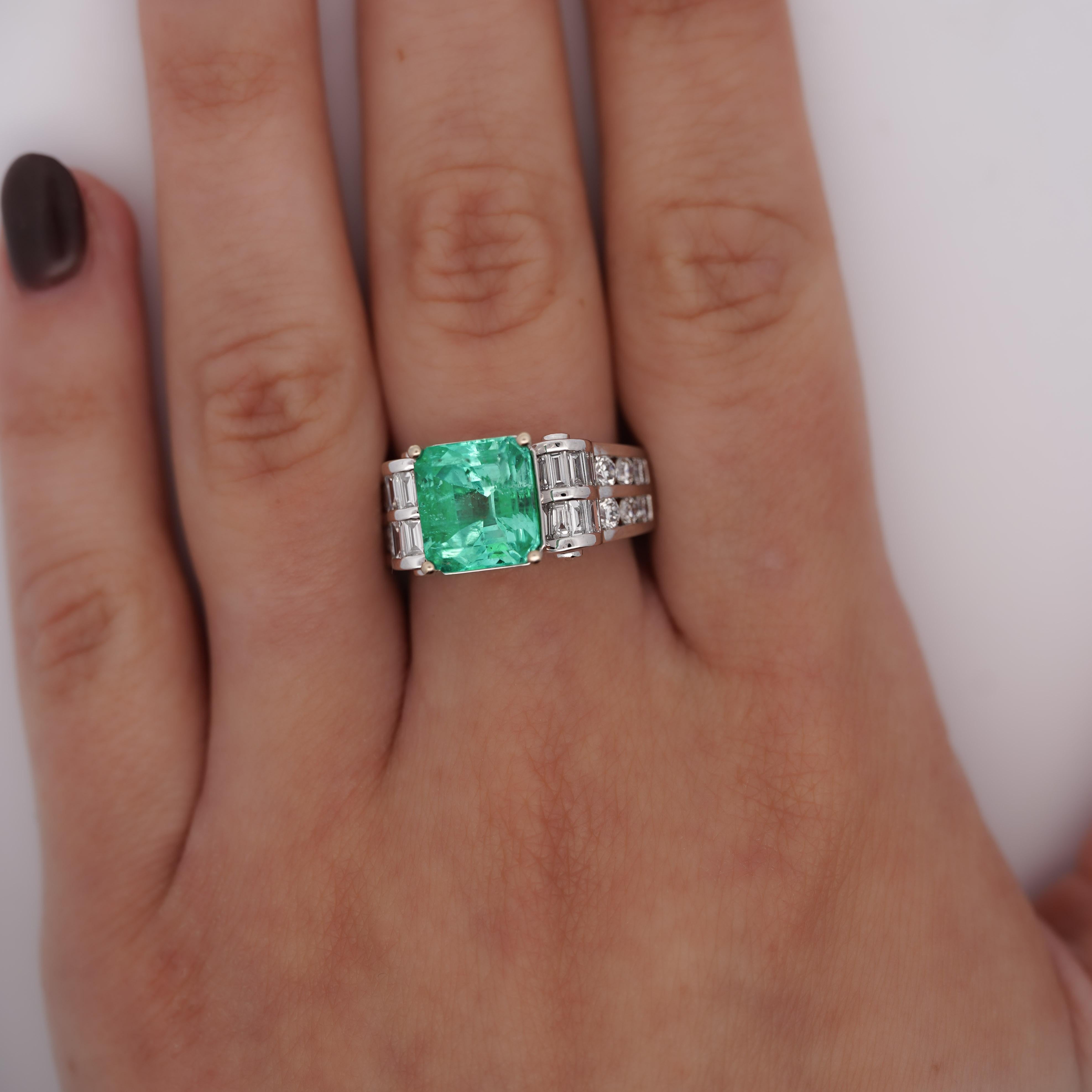 GRS Certified 4.17 Carat Minor Oil Colombian Emerald and 1.60 Carat Diamond Cocktail Ring in 18k White Gold. Unisex.  

Details:
Item Type: Cocktail Ring
Metal: 14K White Gold
Size: 7 1/4 (Adjustable)
Weight: 8.67 grams
Band Width: 8mm

Center Stone