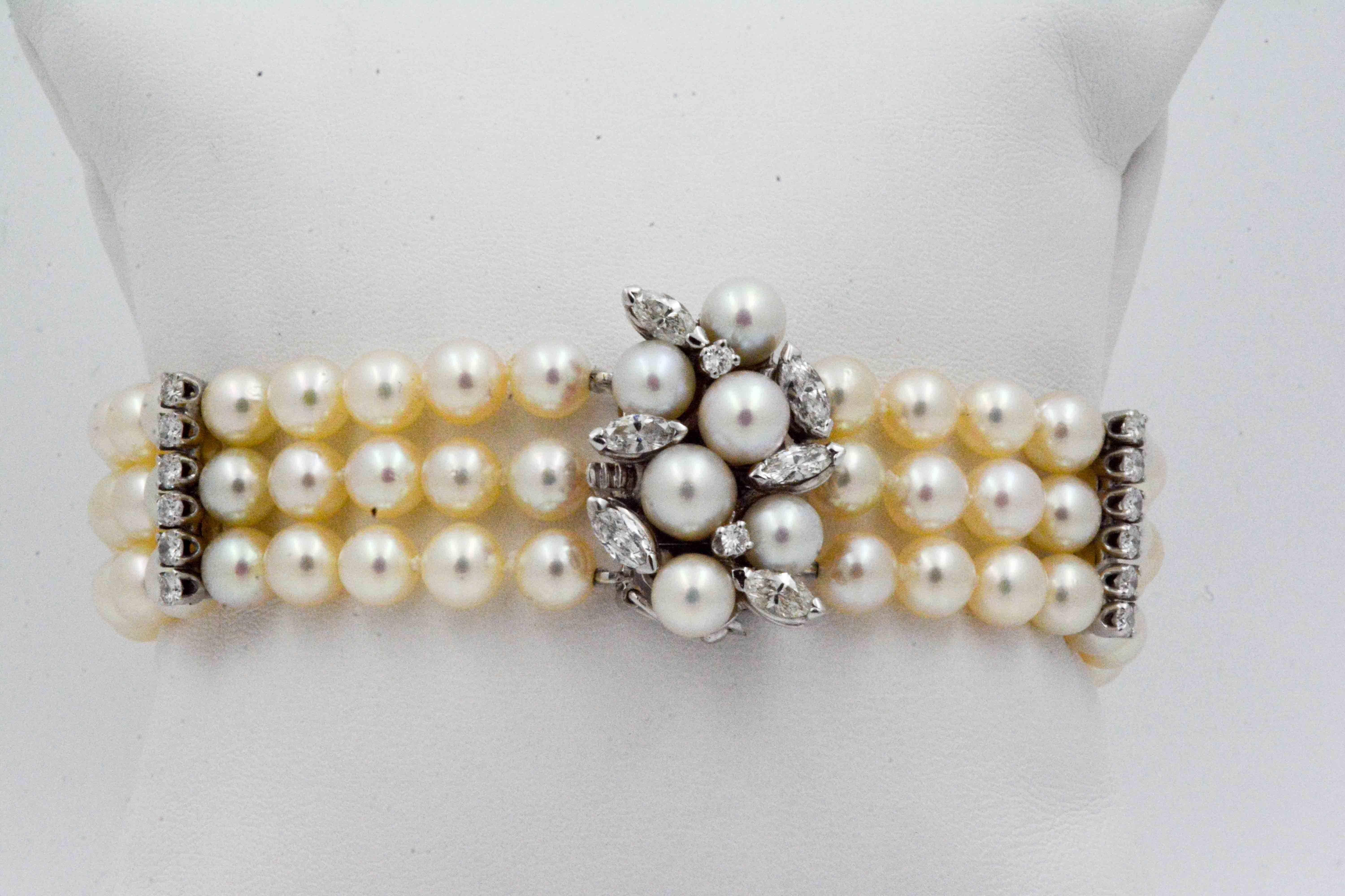 Head and shoulders above other bracelets, this regal 3 strand pearl bracelet has diamond accents set in 14 karat white gold. 90 amazing pearls measuring 5.5 - 6 mm.  are perfectly divided with 38 round brilliant cut diamonds (3.17 ctw, H-I color, SI