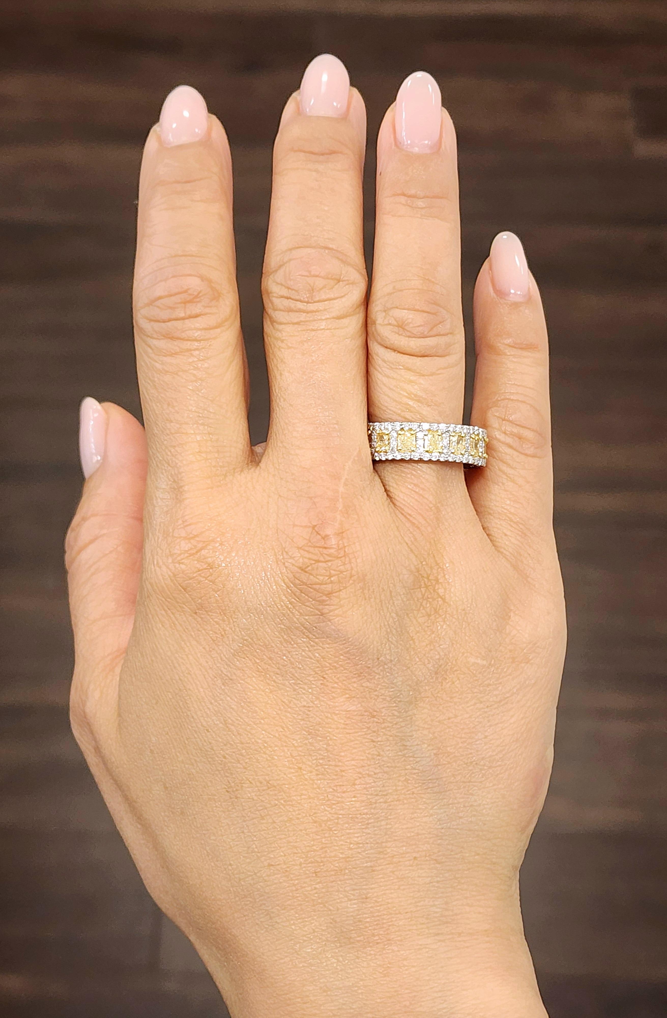 This natural yellow and diamond eternity band is a stunner! The band features 15 yellow radiant diamonds weighing 2.87 ct and 139 diamonds weighing 1.30 ct set in platinum, a definite must have for any fashionista.  