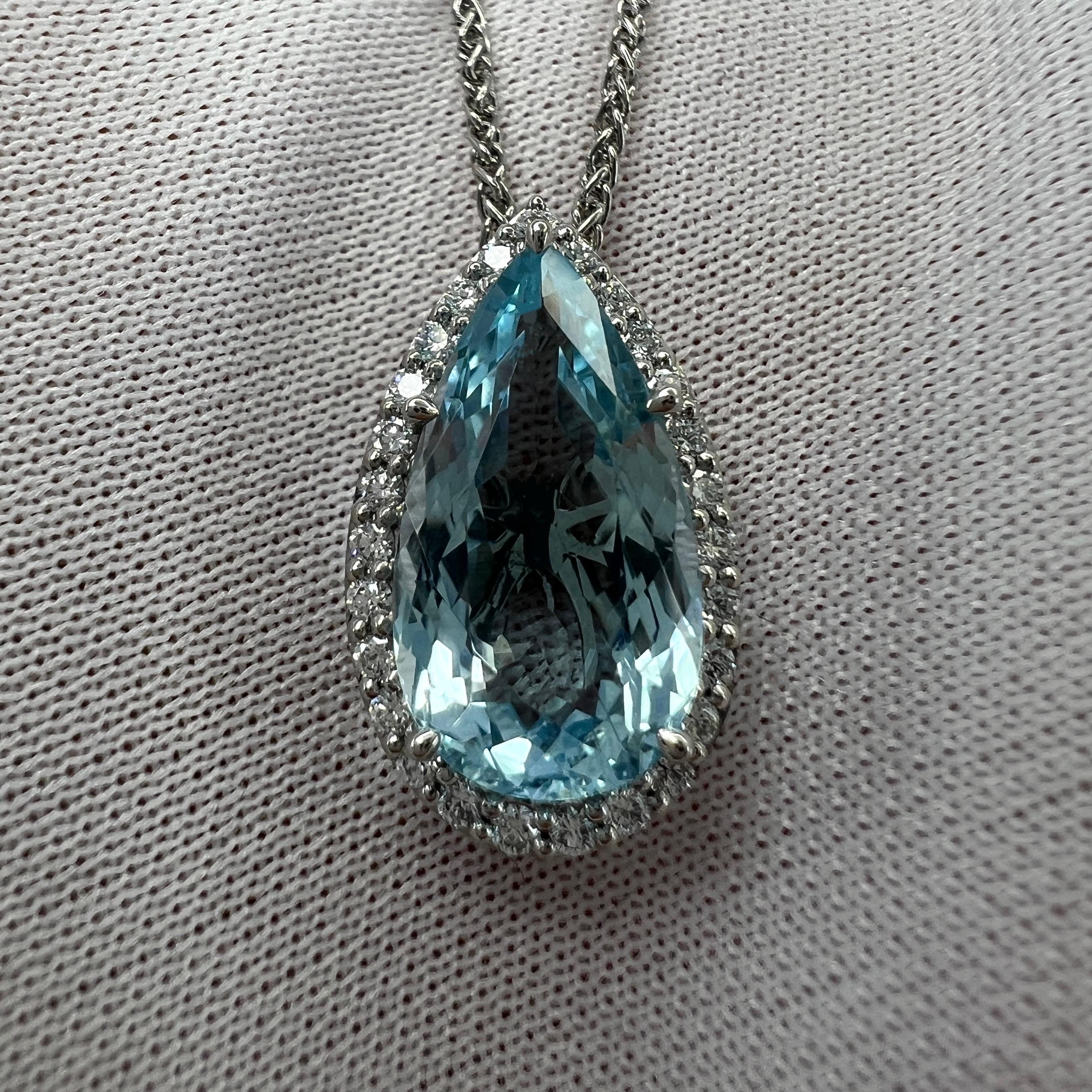 Fine Blue Natural Pear Cut Aquamarine & Diamond Platinum Halo Pendant Necklace.

4.17 Carat aquamarine with a stunning fine blue colour and excellent clarity, very clean stone. Practically flawless. 
Also has an excellent pear teardrop cut showing