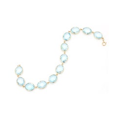 Translucent 41.7 ct Oval Blue Topaz Chain Bracelet in Solid 18K Yellow Gold