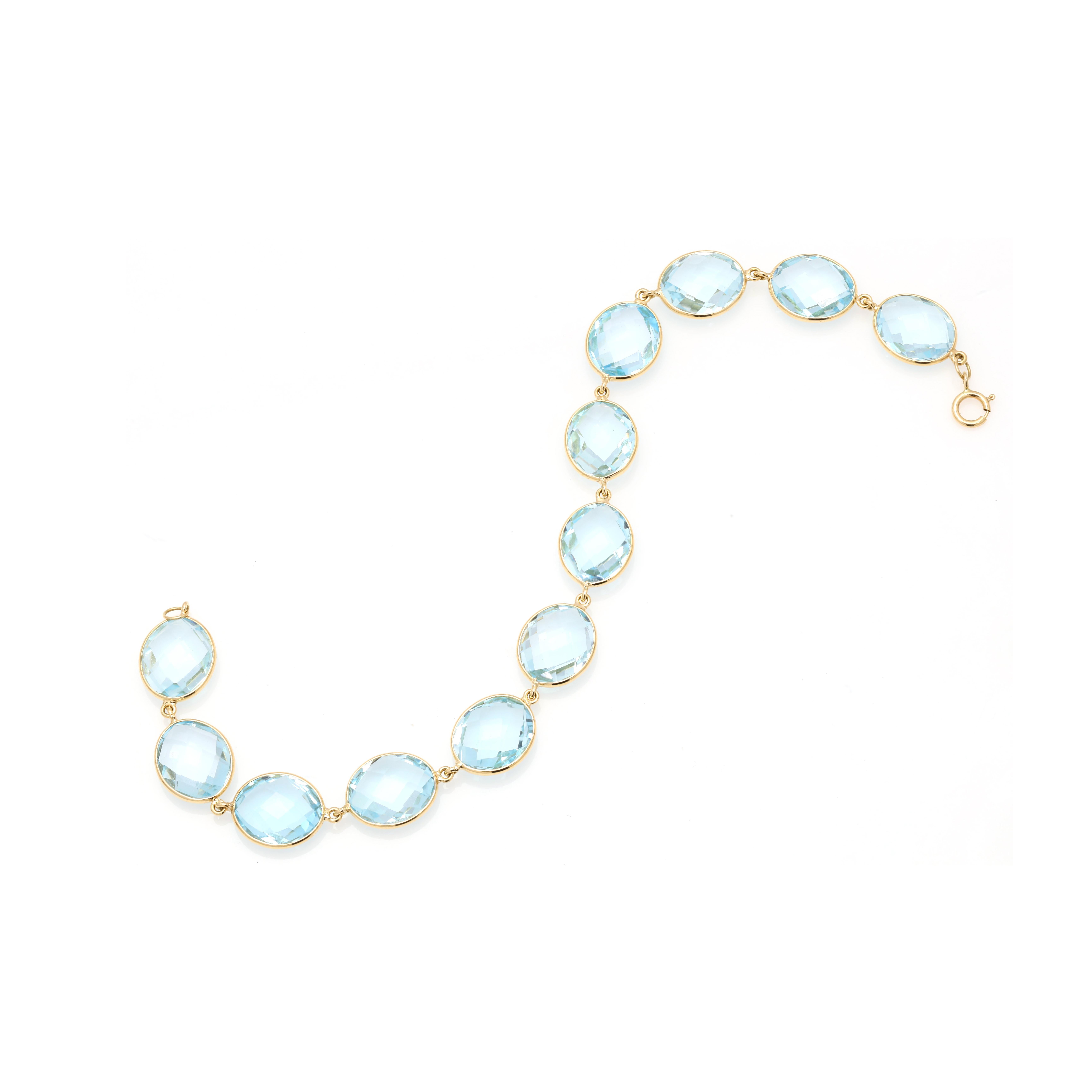 Women's Translucent 41.7 ct Oval Blue Topaz Chain Bracelet in Solid 18K Yellow Gold For Sale