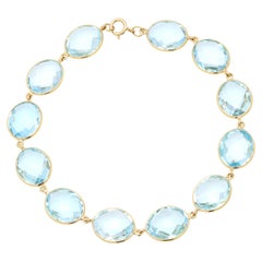 Bracelet à chaîne en or jaune massif 18 carats avec topaze bleue ovale translucide de 41,7 carats