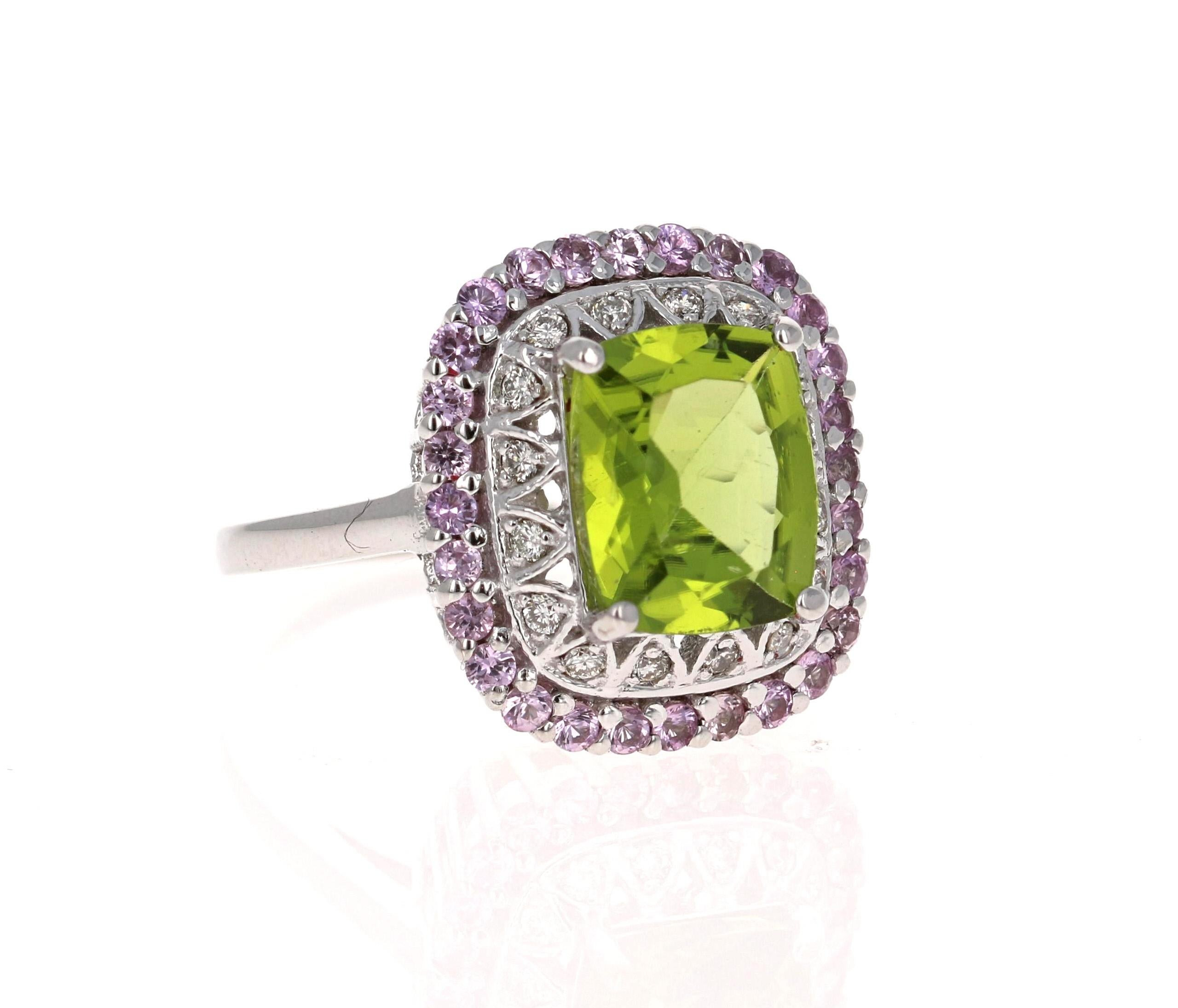 4,18 Karat Peridot im Kissenschliff Saphir und Diamant 14 Karat Weißgold Ring

Dieser schöne Ring hat einen Cushion Cut Peridot, der 3,38 Karat wiegt. Der Ring ist umgeben von 28 hellrosa Saphiren mit einem Gewicht von 0,63 Karat und 16 Diamanten im