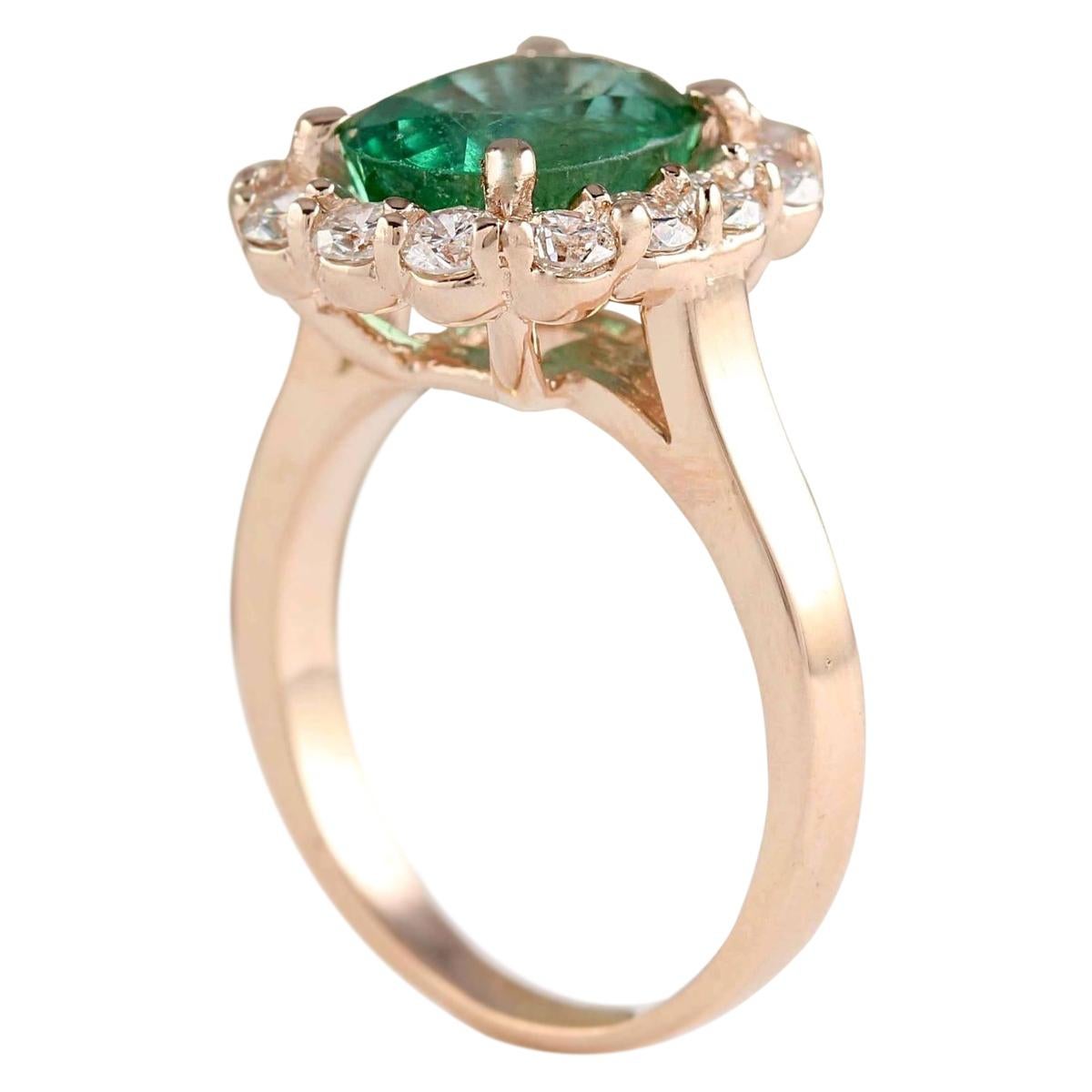 rose gold emerald engagement ring