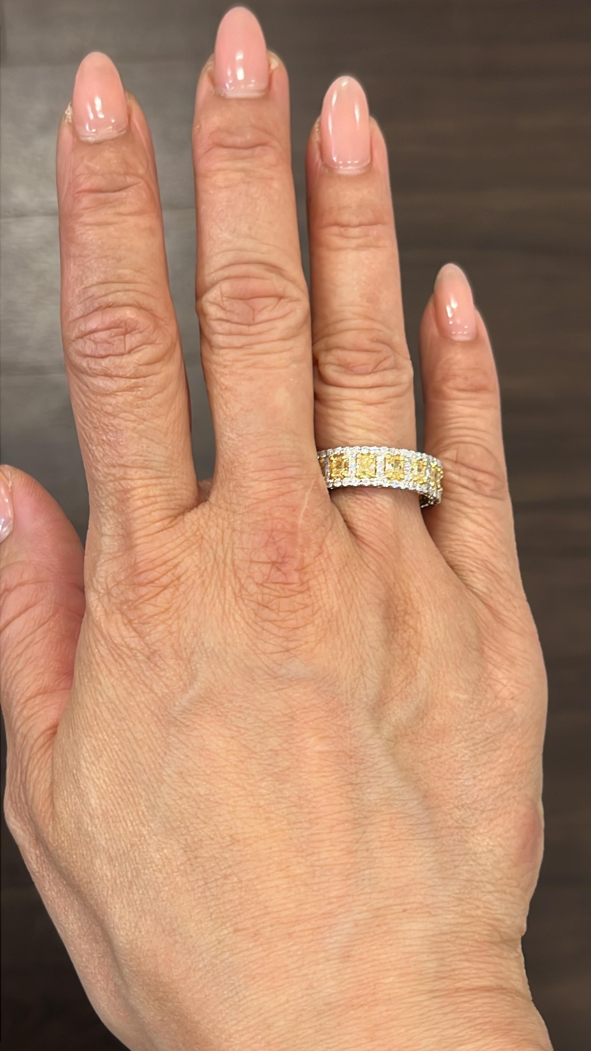 This natural yellow and diamond eternity band is a stunner! The band features 15 yellow radiant diamonds weighing 2.87 ct and 139 diamonds weighing 1.30 ct set in platinum, a definite must have for any fashionista.  