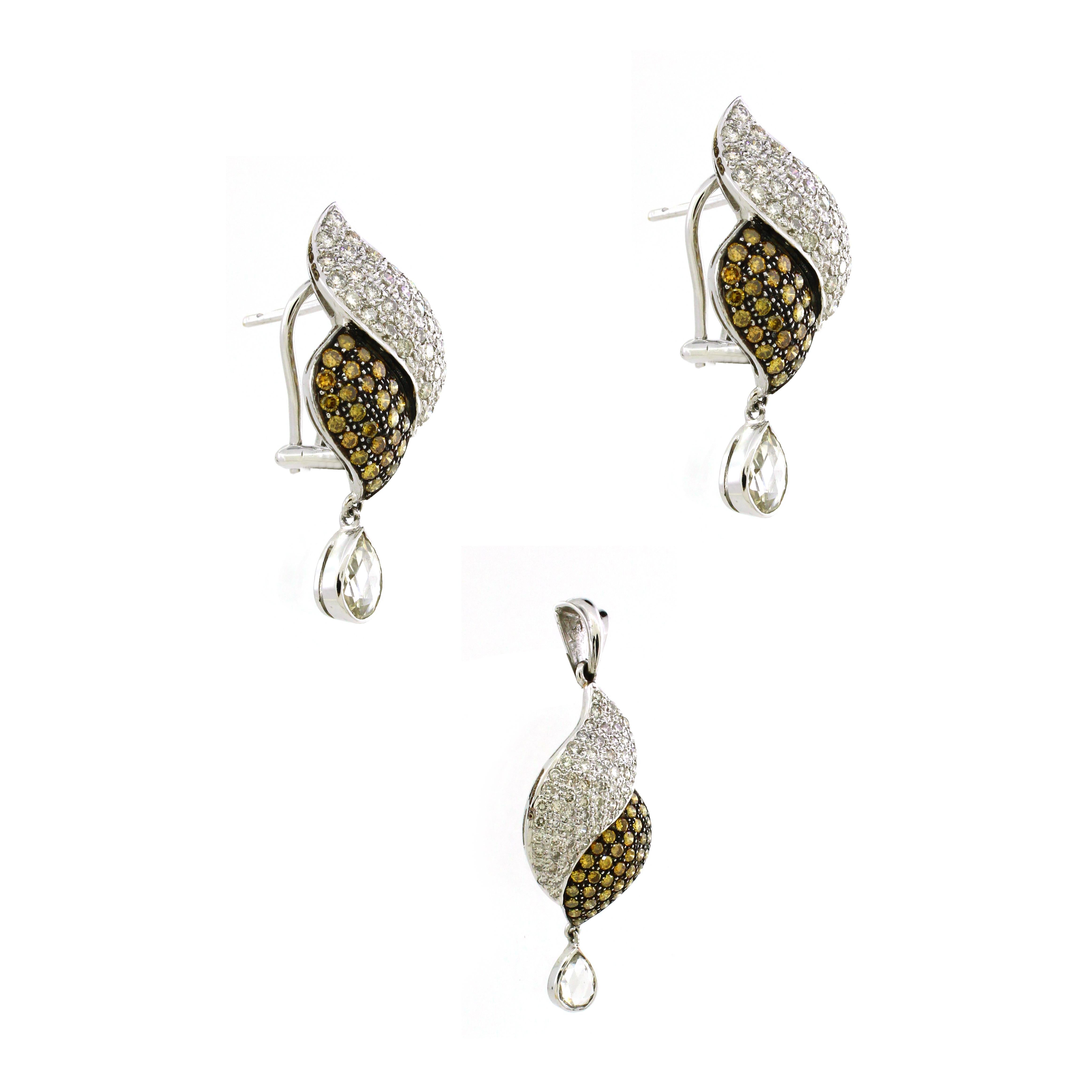 This pendant set, inspired by the natural flow and grace of organic silhouettes, exudes a timeless elegance. Crafted with meticulous attention to detail in 18k white gold, the set weighs a total of 14.93 grams, ensuring both durability and luxury.