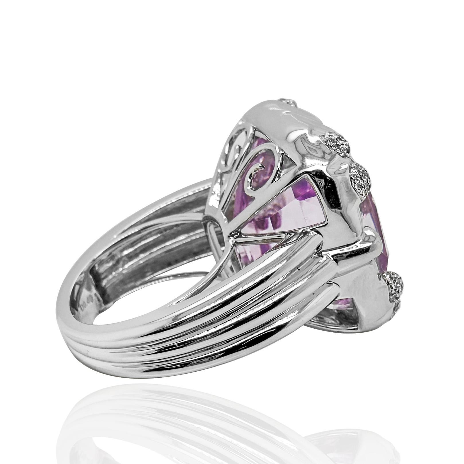 1 Kunzite Gemstone: 41.49 Carats
64 White Diamonds: 0.40 Carat, Round Cut
Metal: 18K White Gold, 19.10 Grams

