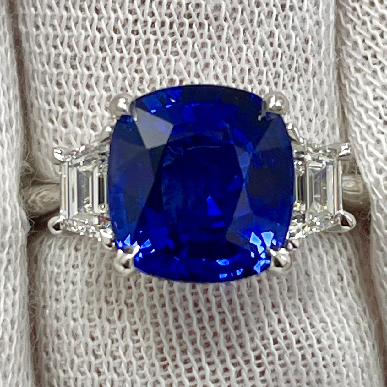 This is a vivid blue cushion sapphire mounted in an elegant 18K white gold ring with 0.44Ct of brilliant white diamonds. Suitable for any occasion!