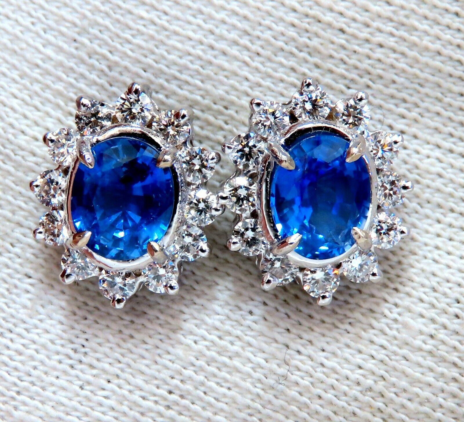 Sapphire Halo Cluster Prime
Natural sapphire & Diamonds classic cocktail Stud earrings

3.05ct total weight sapphires

Ovals, full cut brilliants.

Each sapphire: 7.5 x 6.5mm

Clean clarity & transparent.

Royal Blue Colors

1.14ct. Round Brilliant