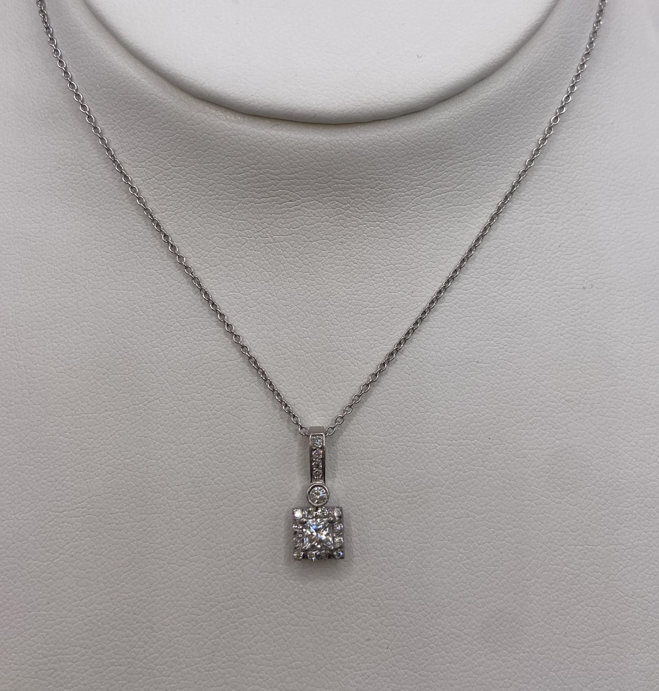 Metal: 18KT White Gold
Designer: SES Creations
Total Carat Weight: 0.41ctw
Chain Length: 16