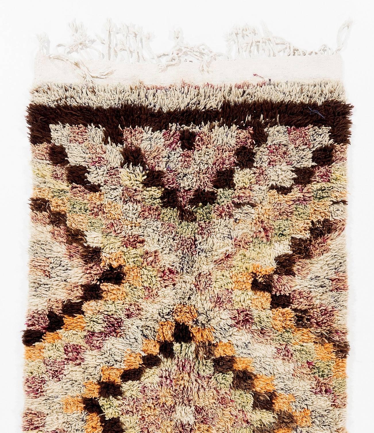 A handmade mid-century 'Tulu' (Turkish word for 'thick piled') runner rug from Konya in Central Turkey. The rug is made of 100% wool, therefore it is very soft and comfortable. 

These simple rugs with geometric modern designs and lustrous wool