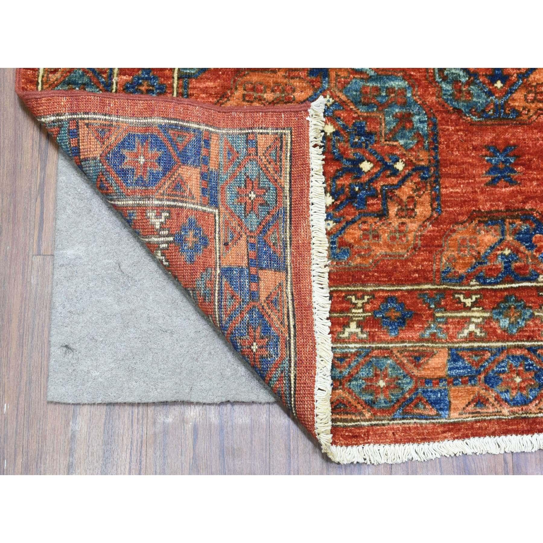This is a truly genuine one-of-a-kind Prismatic Legacy Red, Vegetable Dyes Extra Soft Wool, Hand Knotted Afghan Ersari with Elephant Feet Design, Soft and Lush Pile, Wide Runner Oriental Rug. It has been Knotted for months and months in the