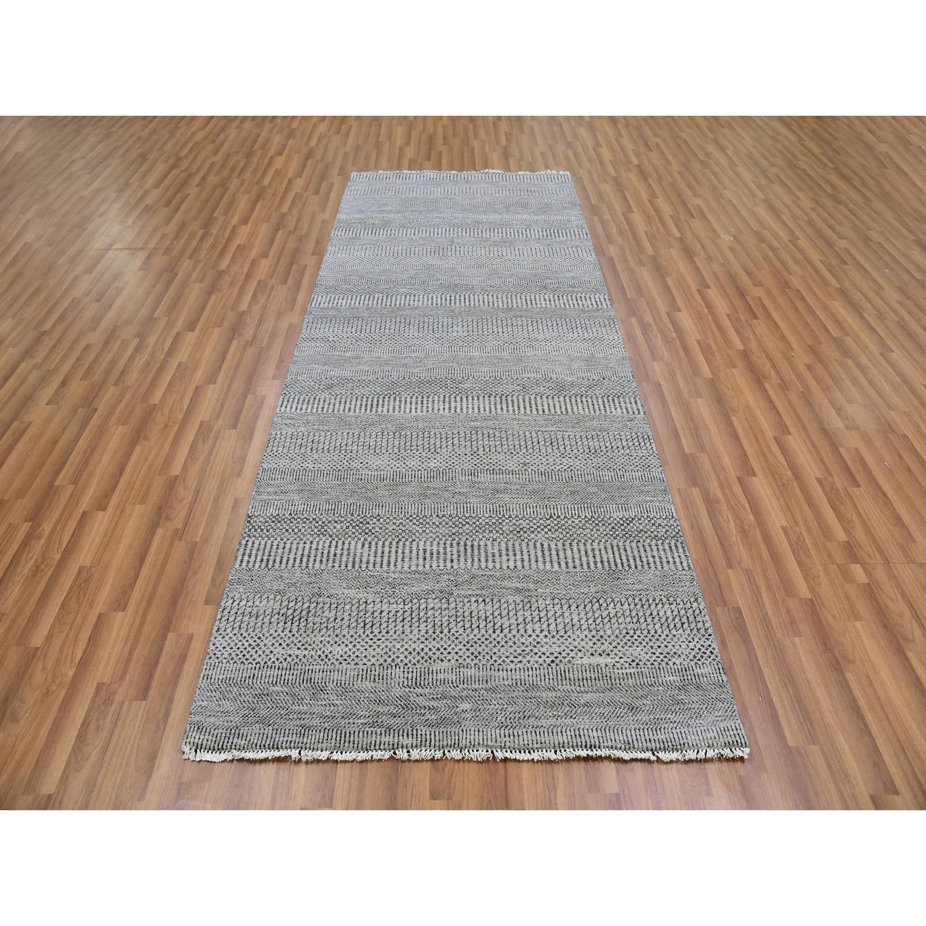 This is a truly genuine one-of-a-kind Undyed 100% Wool, Tone on Tone, Modern Grass Design, Hand Knotted, Oriental Rug. It has been Knotted for months and months in the centuries-old weaving craftsmanship techniques by artisans.
Primary materials: