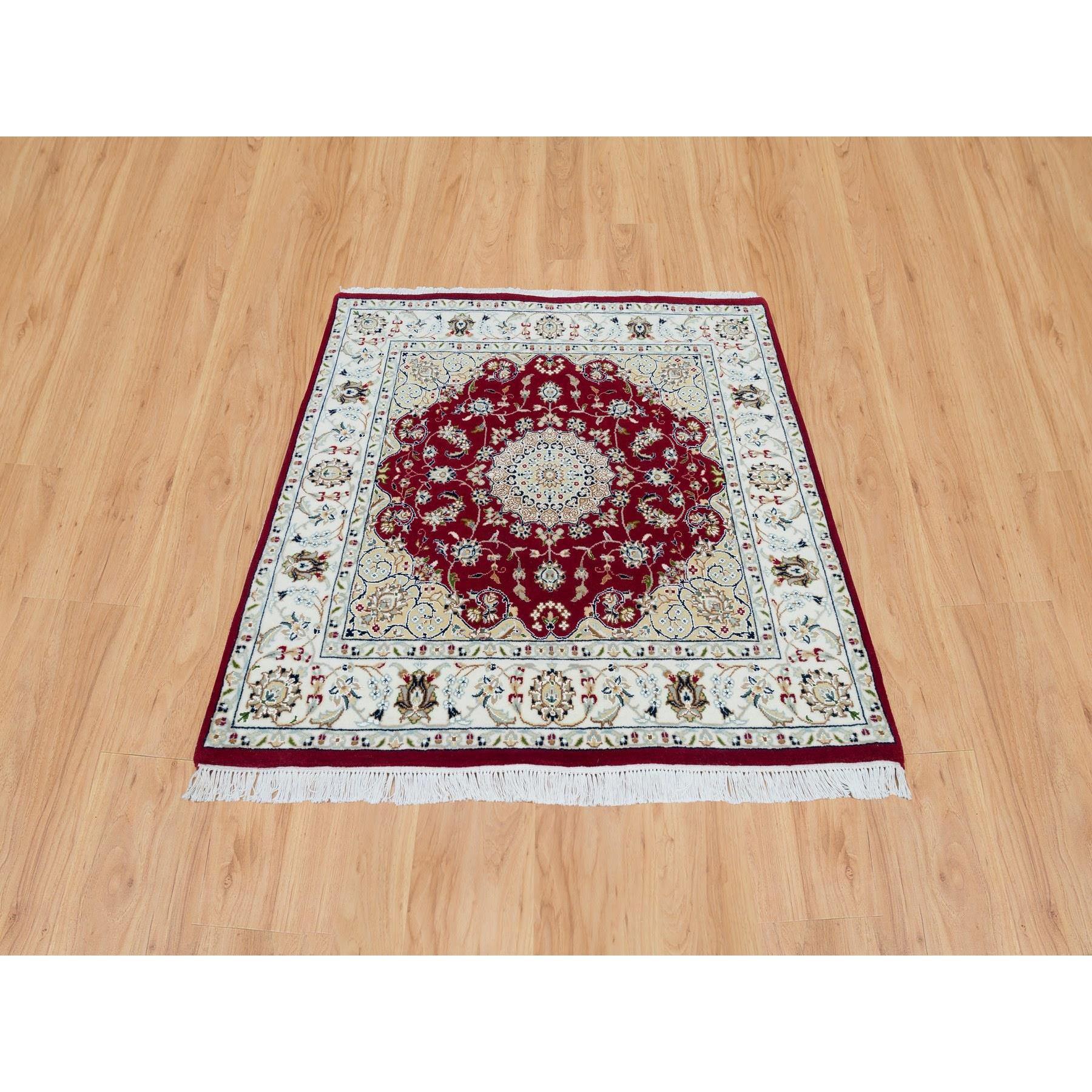 Burgundy Red, Hand Knotted, Nain with Center Medallion Flower Design, 250 KPSI, Natural Wool, Square Oriental Rug
mary materials: Wool
Latex: No Pile 
height: 0.25 Inches
Style: Traditional
Primary color: Red
Secondary colors: Green, Brown, Cream