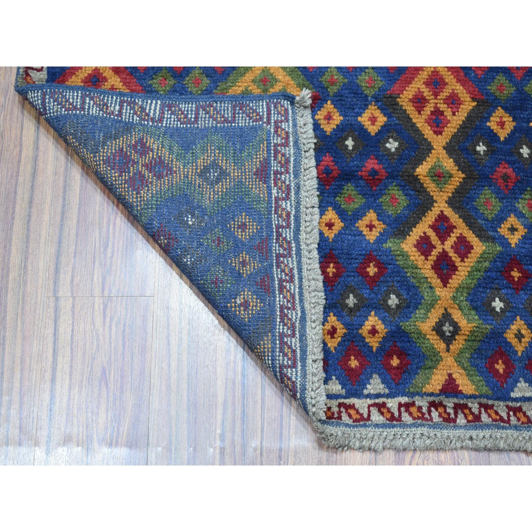 This is a truly genuine one-of-a-kind Blue Colorful Afghan Baluch Geometric Design Hand Knotted Pure Wool Oriental Rug. It has been woven for months and months in the centuries-old Persian weaving craftsmanship techniques by expert artisans.
Primary