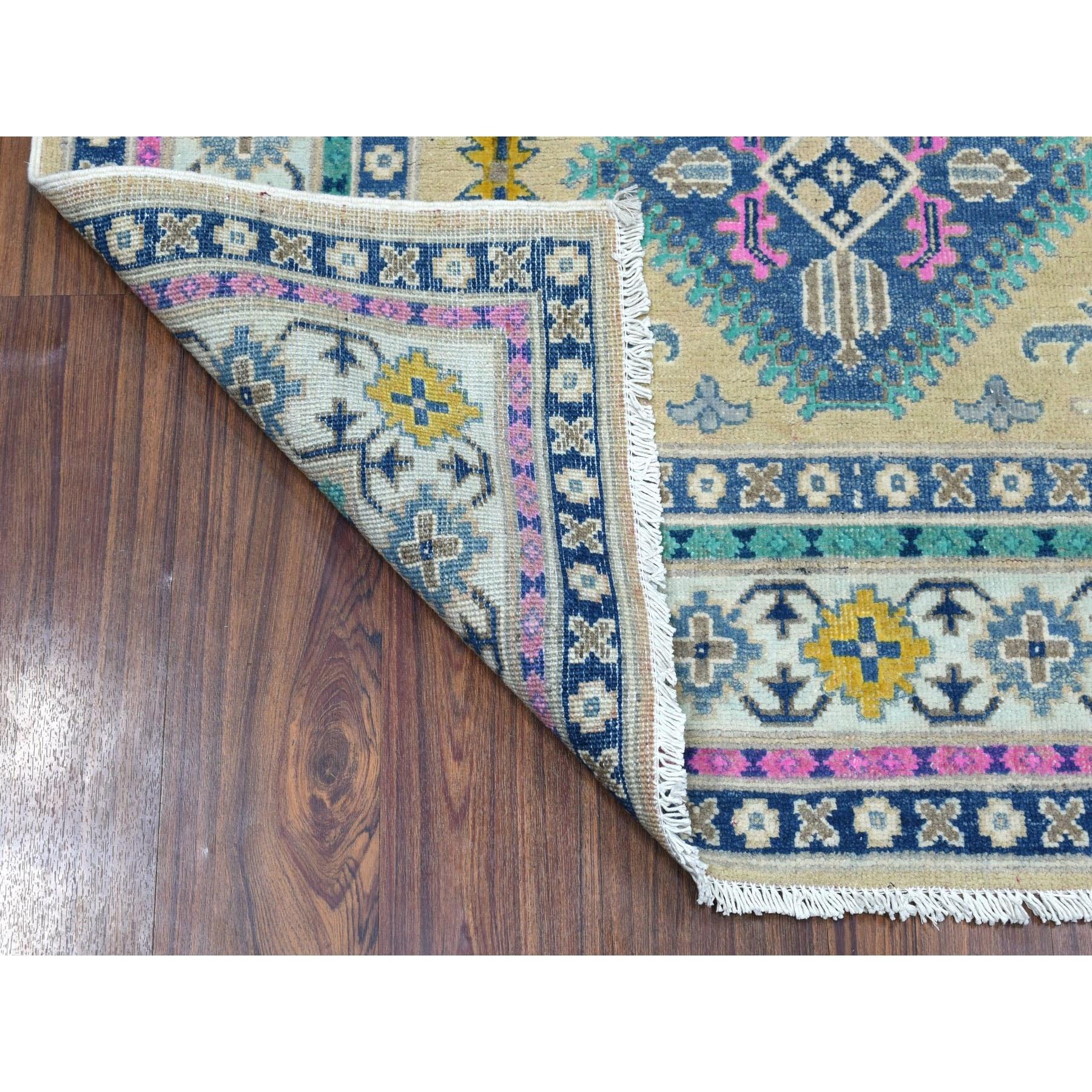 This is a truly genuine one-of-a-kind Colorful Beige Fusion Kazak Pure Wool Hand Knotted Oriental Rug. It has been Knotted for months and months in the centuries-old Persian weaving craftsmanship techniques by expert artisans.
Primary materials: