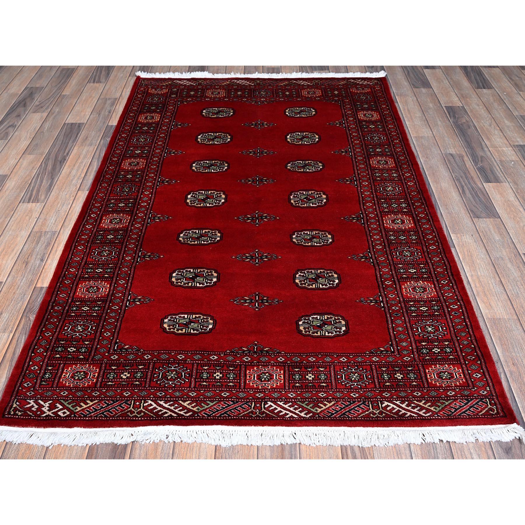Berry Red, Princess Bokara with Tribal Medallions, Vegetable Dyes, Soft and Shiny Wool, Hand Knotted, Oriental Rug
Primary materials: Wool
Latex: No Pile 
height: 0.25 Inches
Style: Traditional
Primary color: Red
Secondary colors: Ivory, Beige,