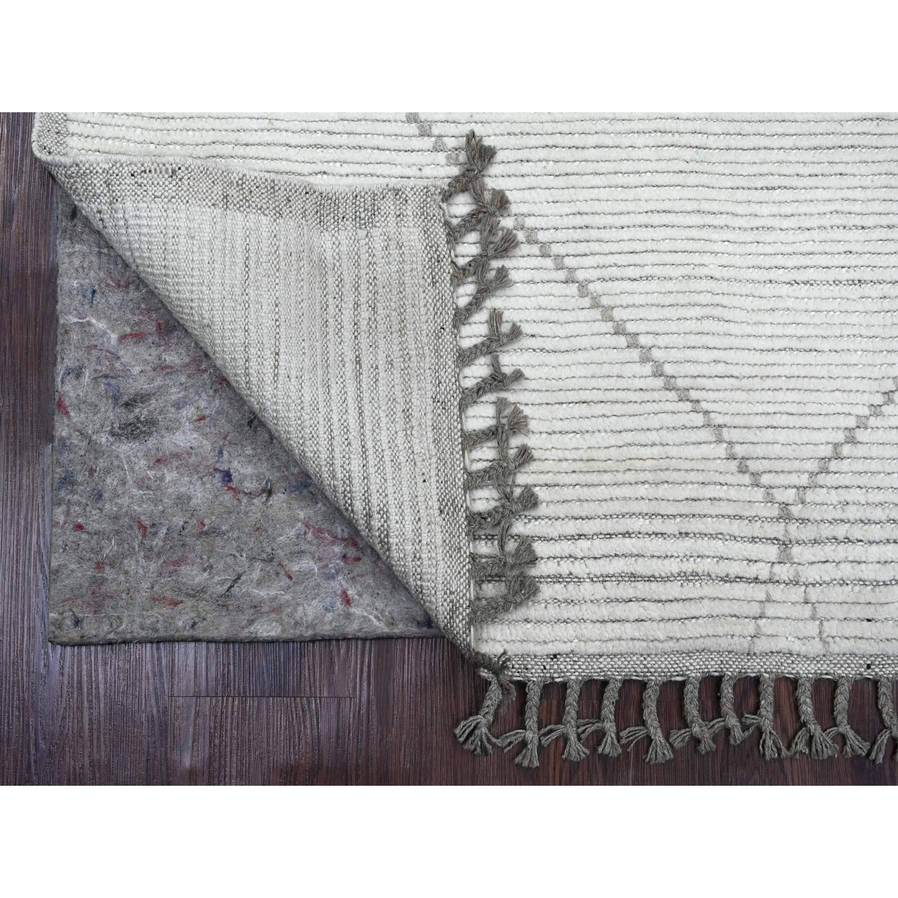 Cotton White, Moroccan Weave with Geometric Pattern, Hand Knotted, Soft Wool, Tone on Tone, Textured Pile, Oriental Rug
Primary materials: Wool
Latex: No Pile 
height: 0.25 Inches
Style: Traditional
Primary color: Ivory
Secondary colors: