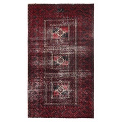 Tappeto di lana persiano vintage Baluch annodato a mano 4
1 "x7
1" rosso cancellato e consumato