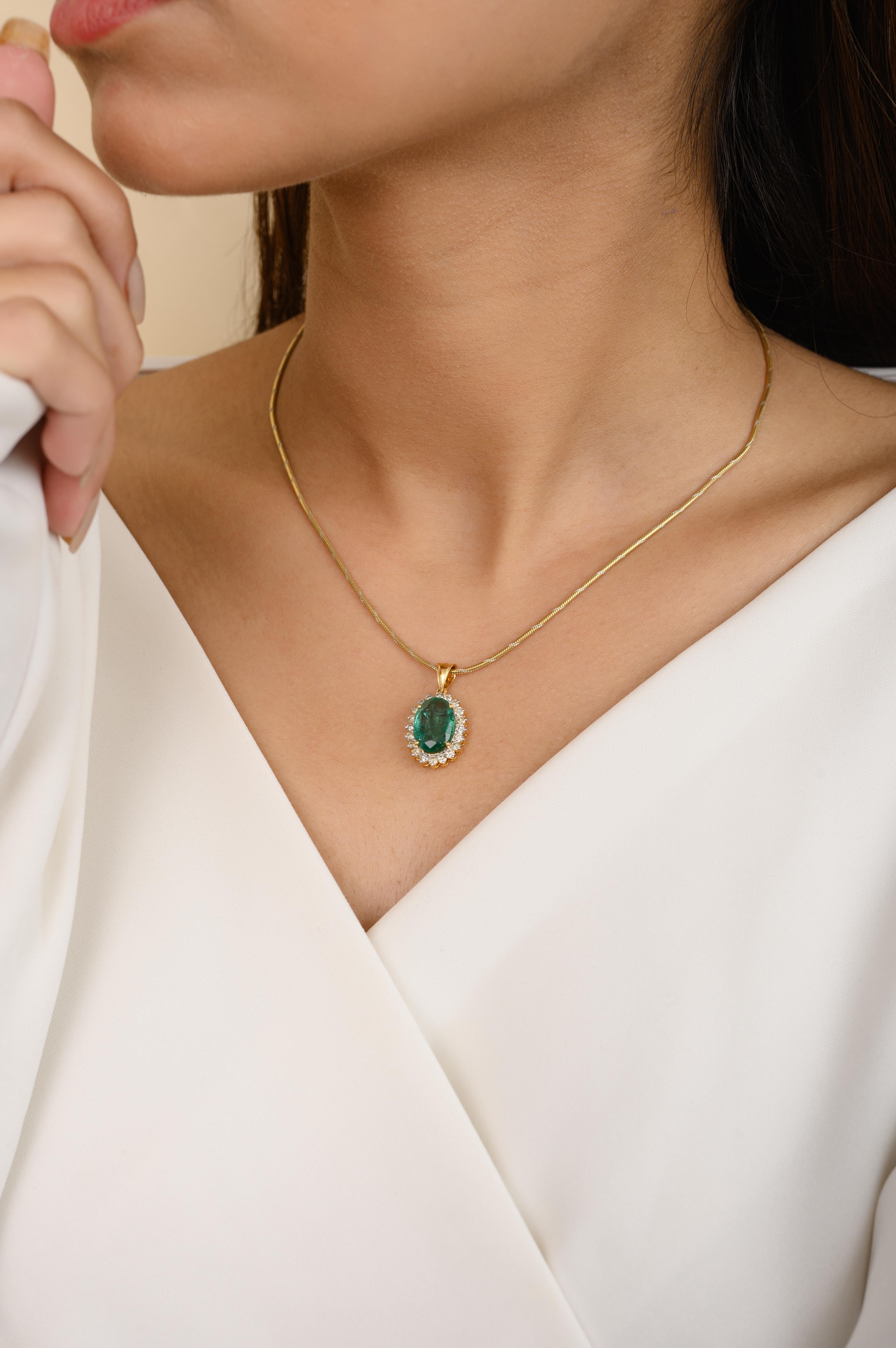 4.2 Carat Oval Emerald Diamond Halo Pendant in 14K Gold studded with oval cut emerald and halo of diamonds. This stunning piece of jewelry instantly elevates a casual look or dressy outfit. 
Emerald enhances the intellectual capacity of the