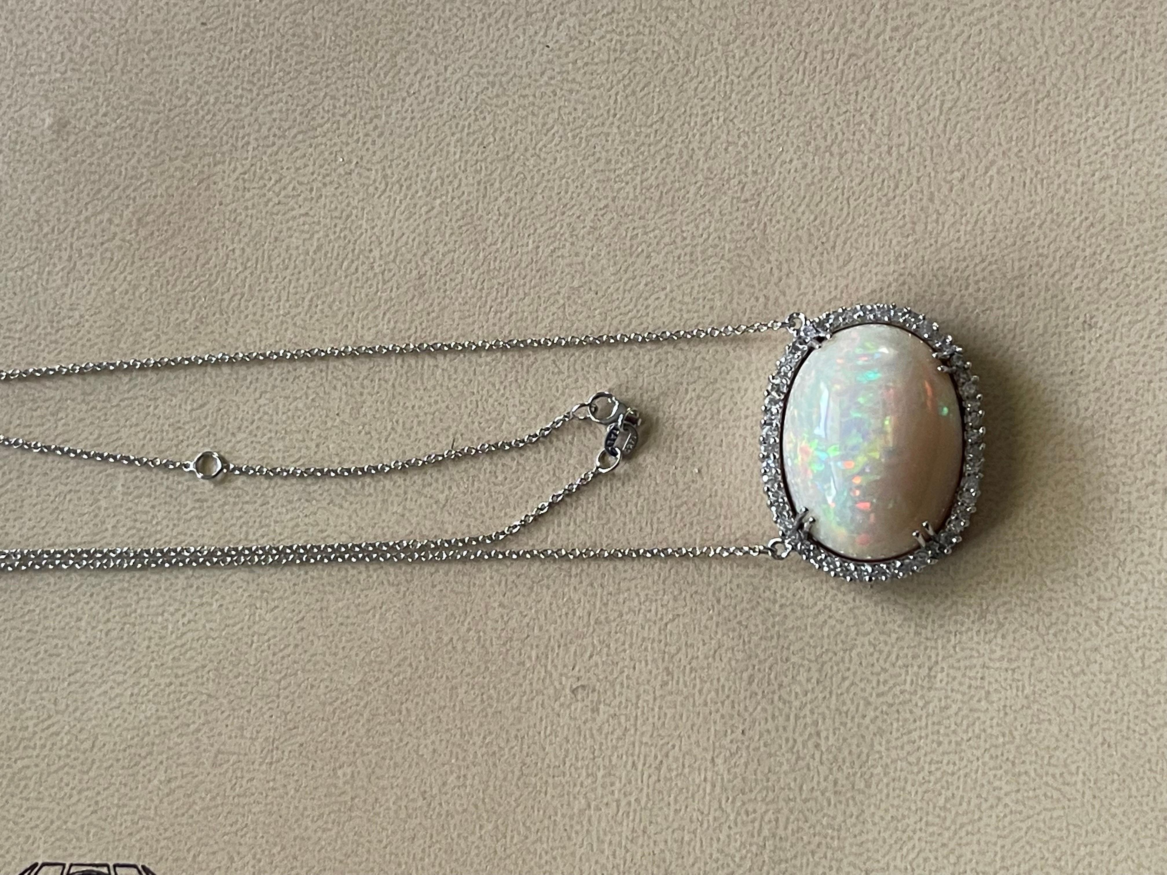 42 Carat Oval Ethiopian Opal & Diamond Pendant 14 Karat White Gold Necklace In Excellent Condition For Sale In New York, NY