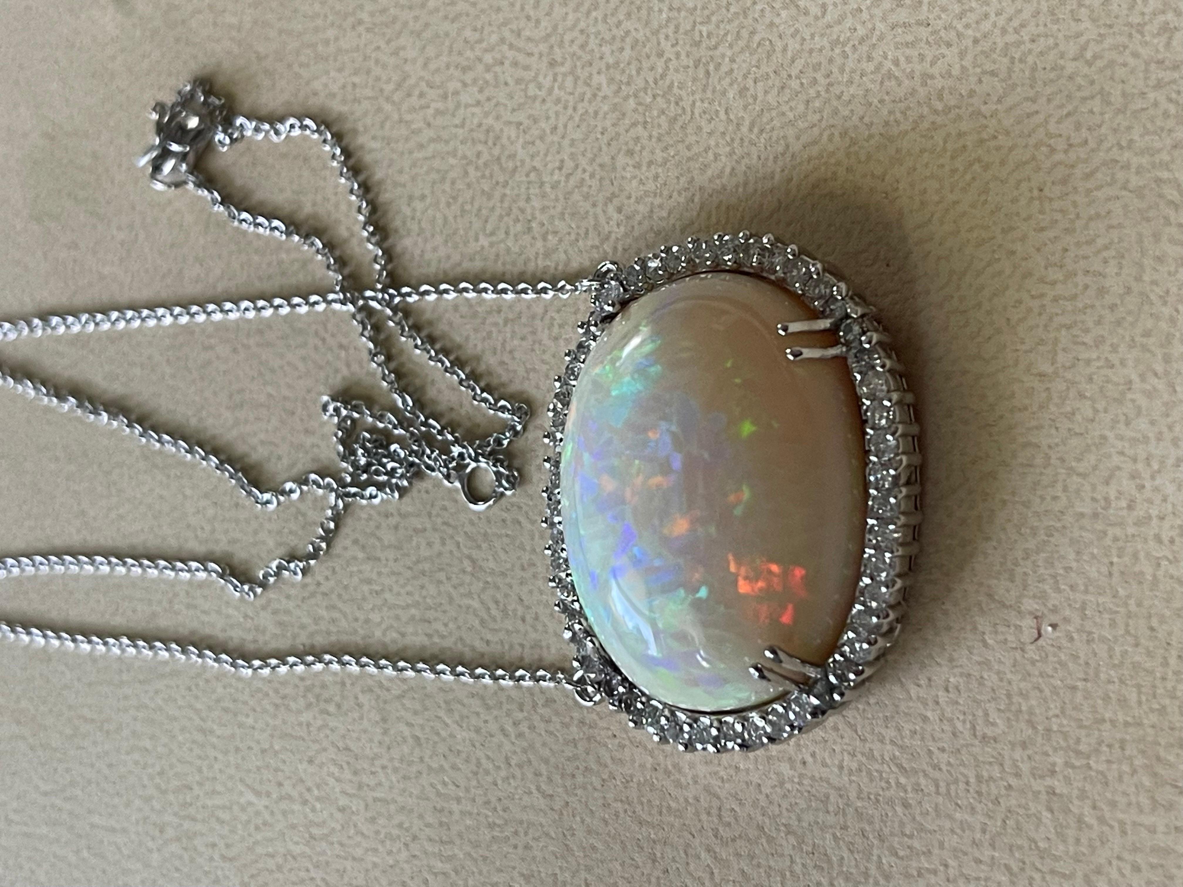 Women's 42 Carat Oval Ethiopian Opal & Diamond Pendant 14 Karat White Gold Necklace For Sale