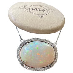 42 Carat Oval Ethiopian Opal & Diamond Pendant 14 Karat White Gold Necklace