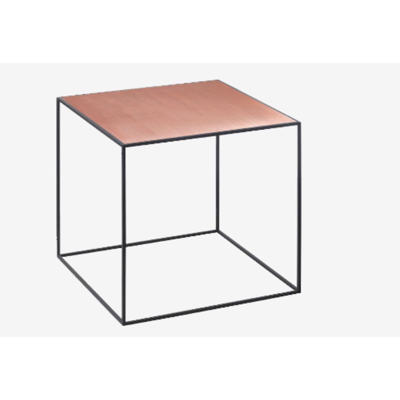 42 copper twin table by Lassen
Dimensions: W 42 x D 42 x H 0.5 cm 
Materials: Finér, melamin, melamin, melamine, metal, veneer, oak
Also available in different colours and dimensions. 

With an uncomplicated simplicity and a fond reference to