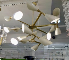 Italian Studio Made Eighteen-Light Cream Cone and Brass Chandelier