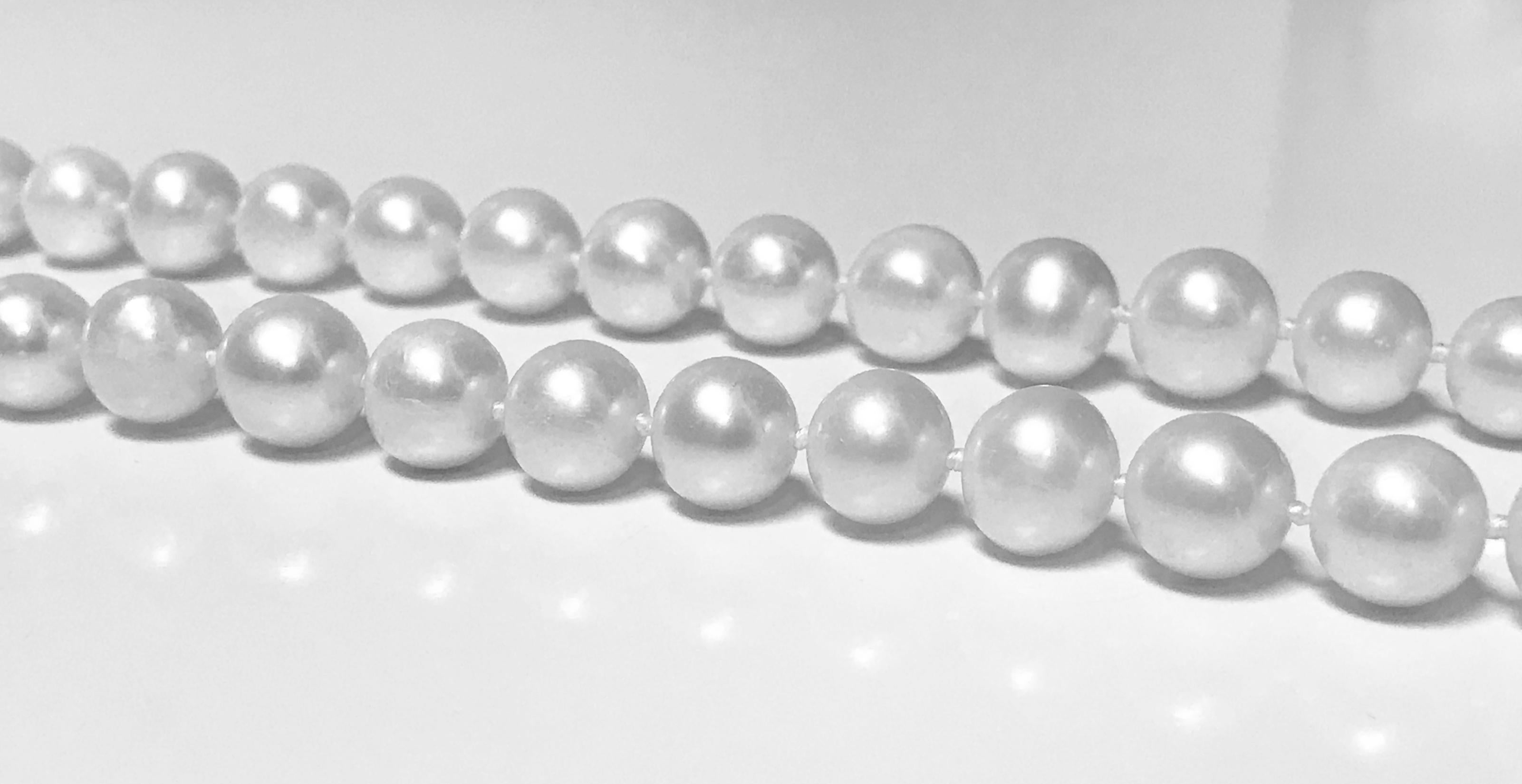 42 inch Strand of Cultured Fresh Water Pearl Necklace comprising 89 well matched slightly off round cultured pearls gauging approximately 10.00 - 11.50 mm, white, medium - high lustre, medium - thick nacre, very slightly blemished, with 14K and