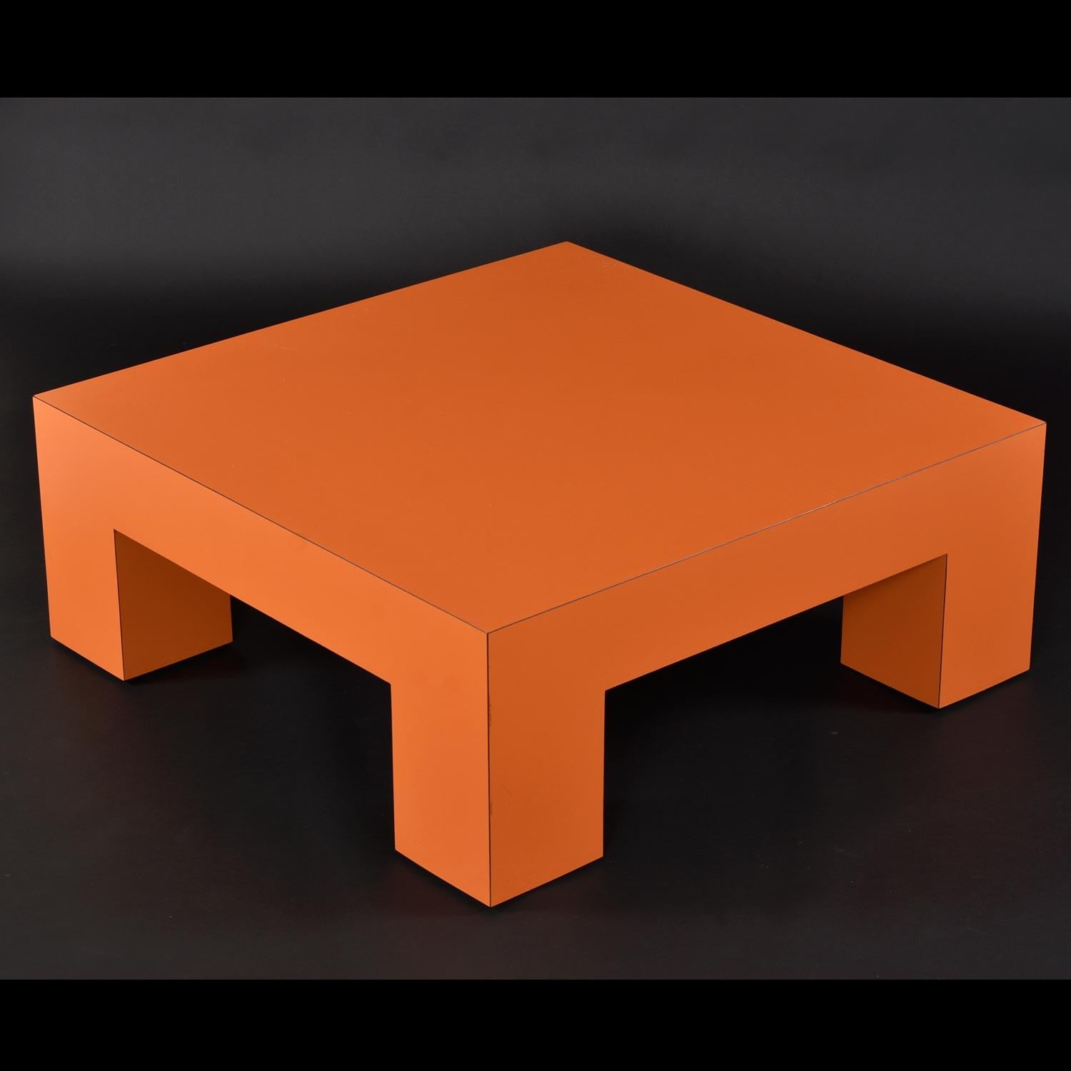 Big, bold, bright, at 42? square this parking-cone orange coffee table refuses to be meek. This table is simultaneously minimalist and maximalist. The designer consciously exaggerated the scale to add presence to an otherwise simple silhouette.