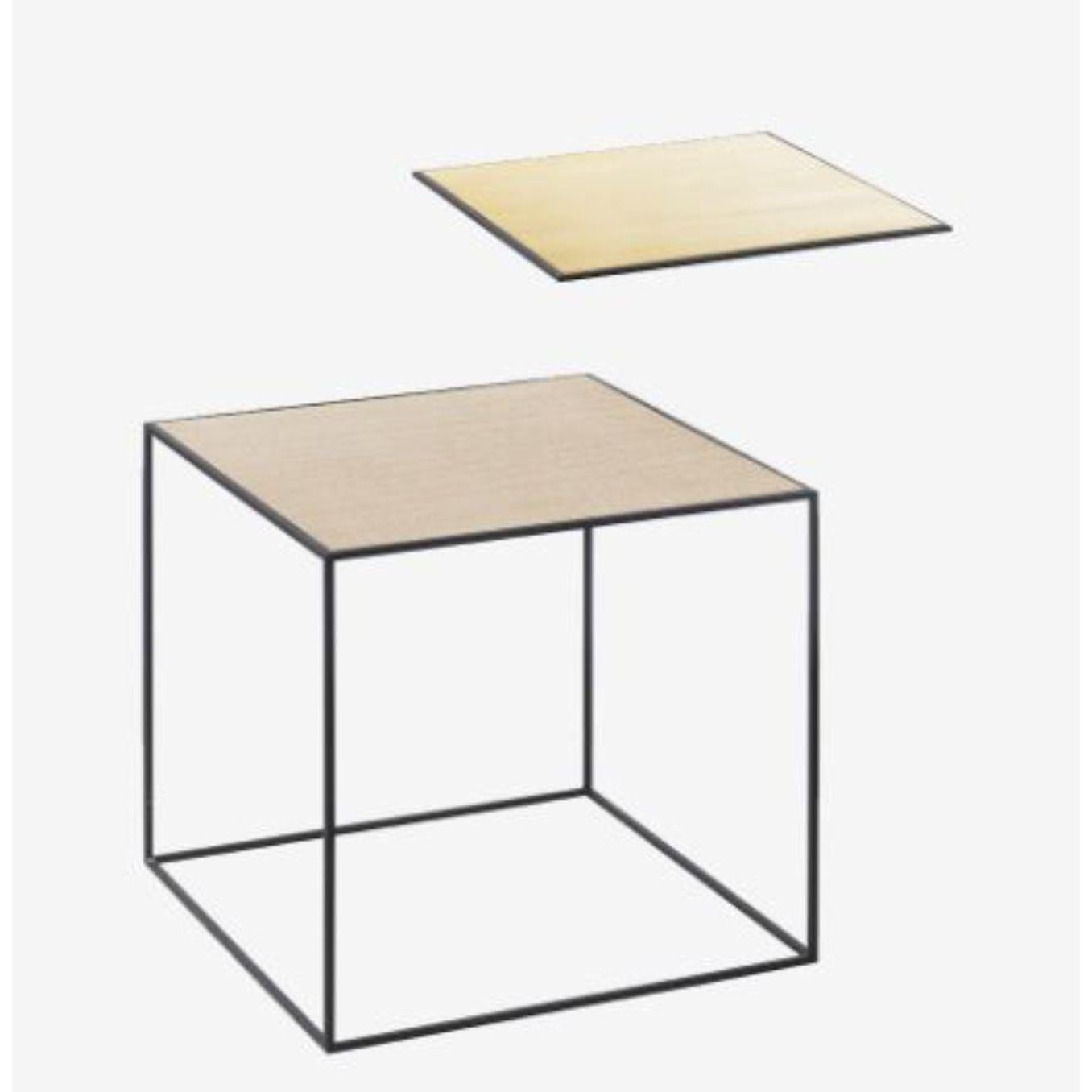 42 Oak brass twin table by Lassen
Dimensions: w 42 x d 42 x h 0.5 cm 
Materials: Finér, Melamin, Melamin, Melamine, Metal, Veneer, Oak, Brass.
Also available in different colors and dimensions. 

With an uncomplicated simplicity and a fond