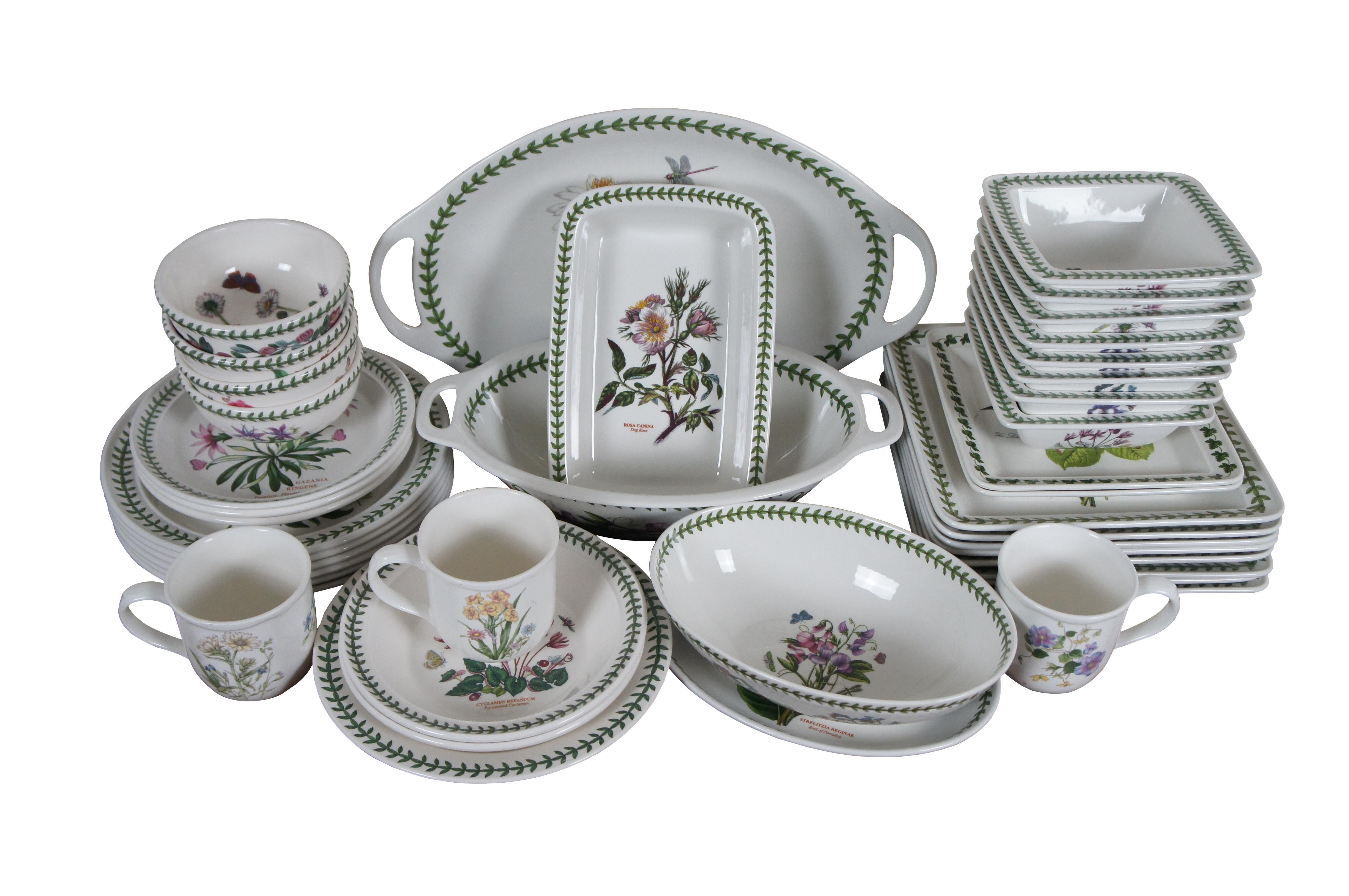 Vintage 42 piece dinnerware / china set by Portmeirion in the Botanic Garden pattern designed by Susan Williams-Ellis, containing pieces purchased at several different times. This pattern is distinguished by a wide variety of botanical illustrations