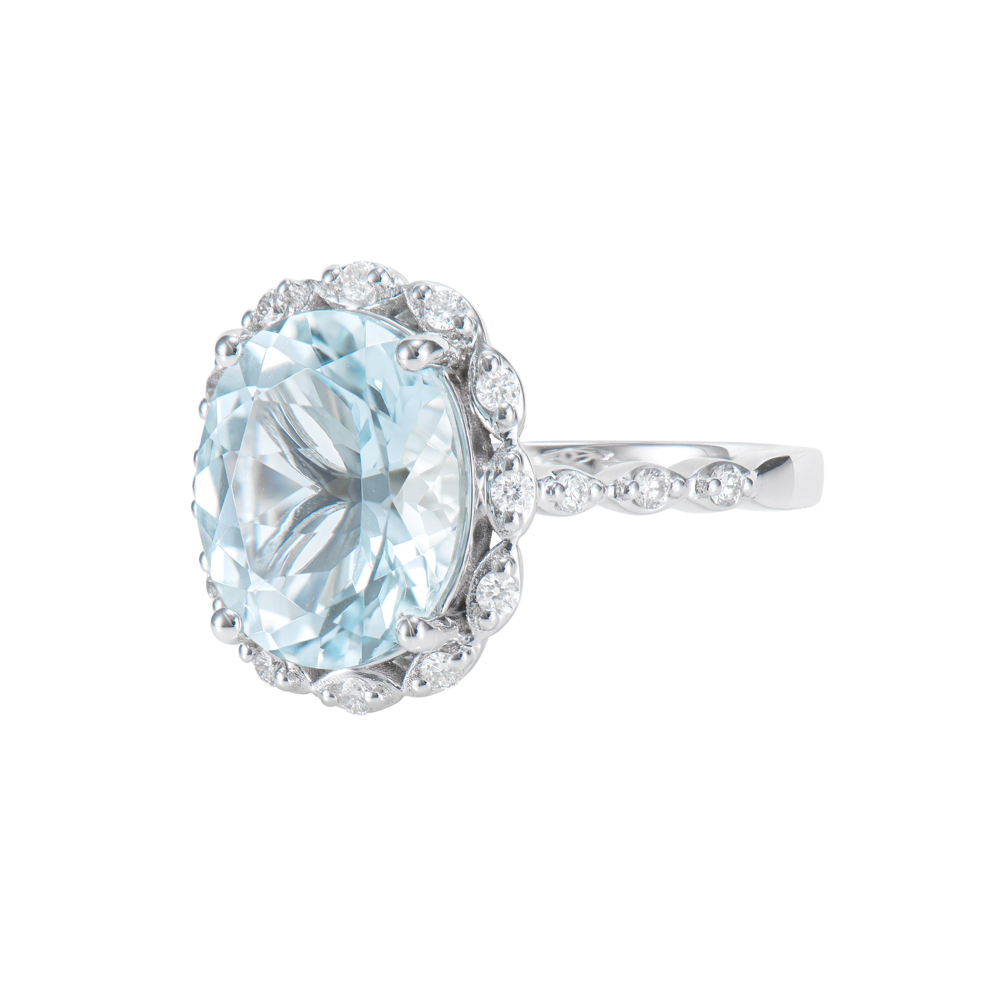 Oval Cut 4.20 Carat Aquamarine Elegant Ring in 18 Karat White Gold with White Diamond. For Sale