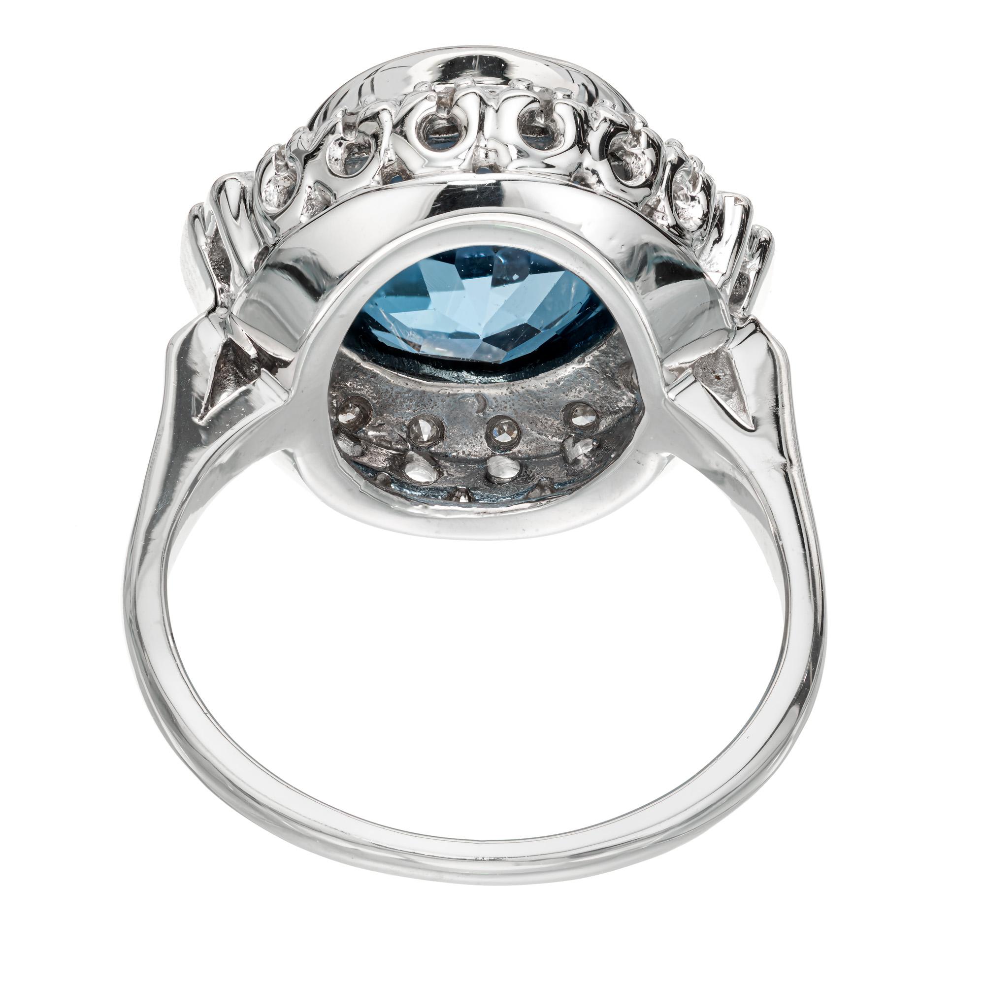 Oval Cut 4.20 Carat Blue Topaz Diamond Halo White Gold Ring  For Sale