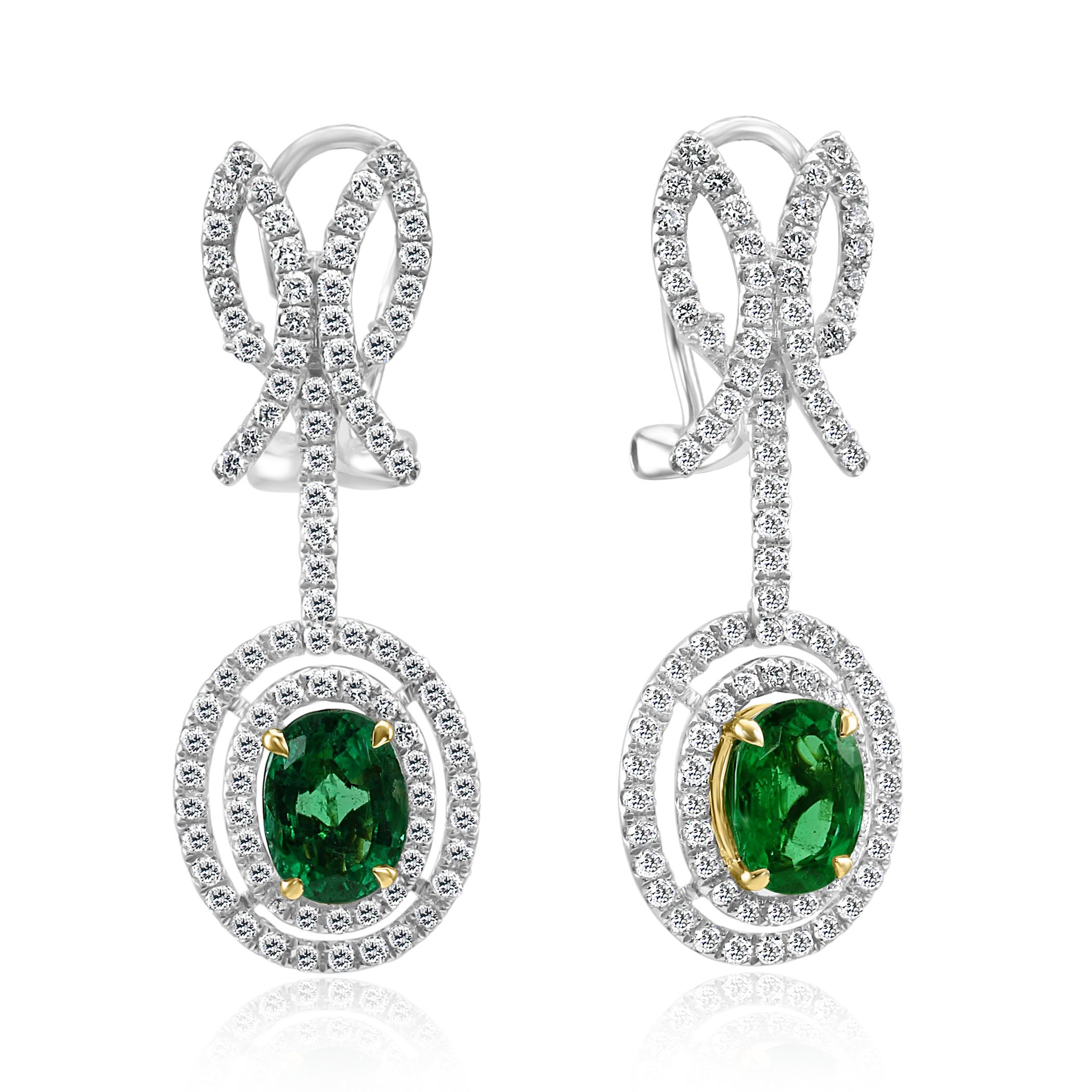 2 Gorgeous Emerald oval 2.60 Carat set in Double Halo of 178 White G-H Color VS-SI Clarity Diamond Rounds 1.60 Carat set in 18K White and Yellow Gold Fashion Dangle Drop Earring.

 Total Stone Weight 4.20 Carat

Style available in different price