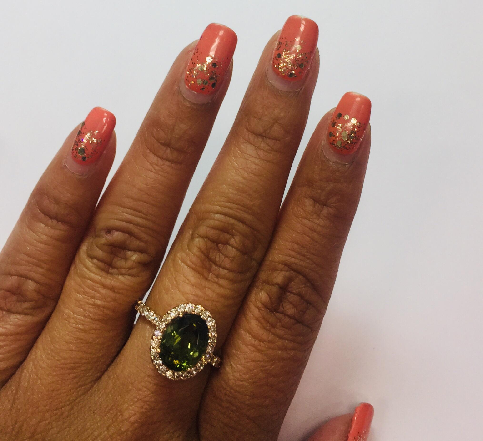 Contemporary 4.20 Carat Green Tourmaline and Diamond 14 Karat Rose Gold Ring For Sale