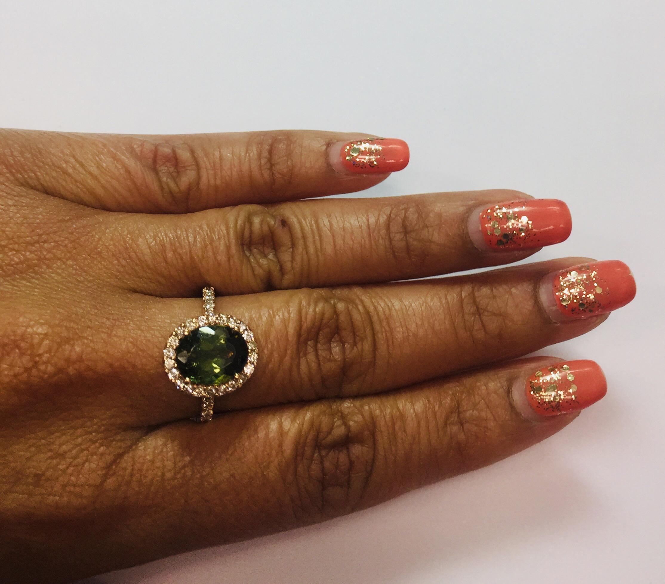 14 Karat Roségold Ring mit 4,20 Karat grünem Turmalin und Diamant (Ovalschliff) im Angebot