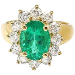Ring aus 14 Karat massivem Gelbgold mit 4,20 Karat natürlichem Smaragd und Diamant