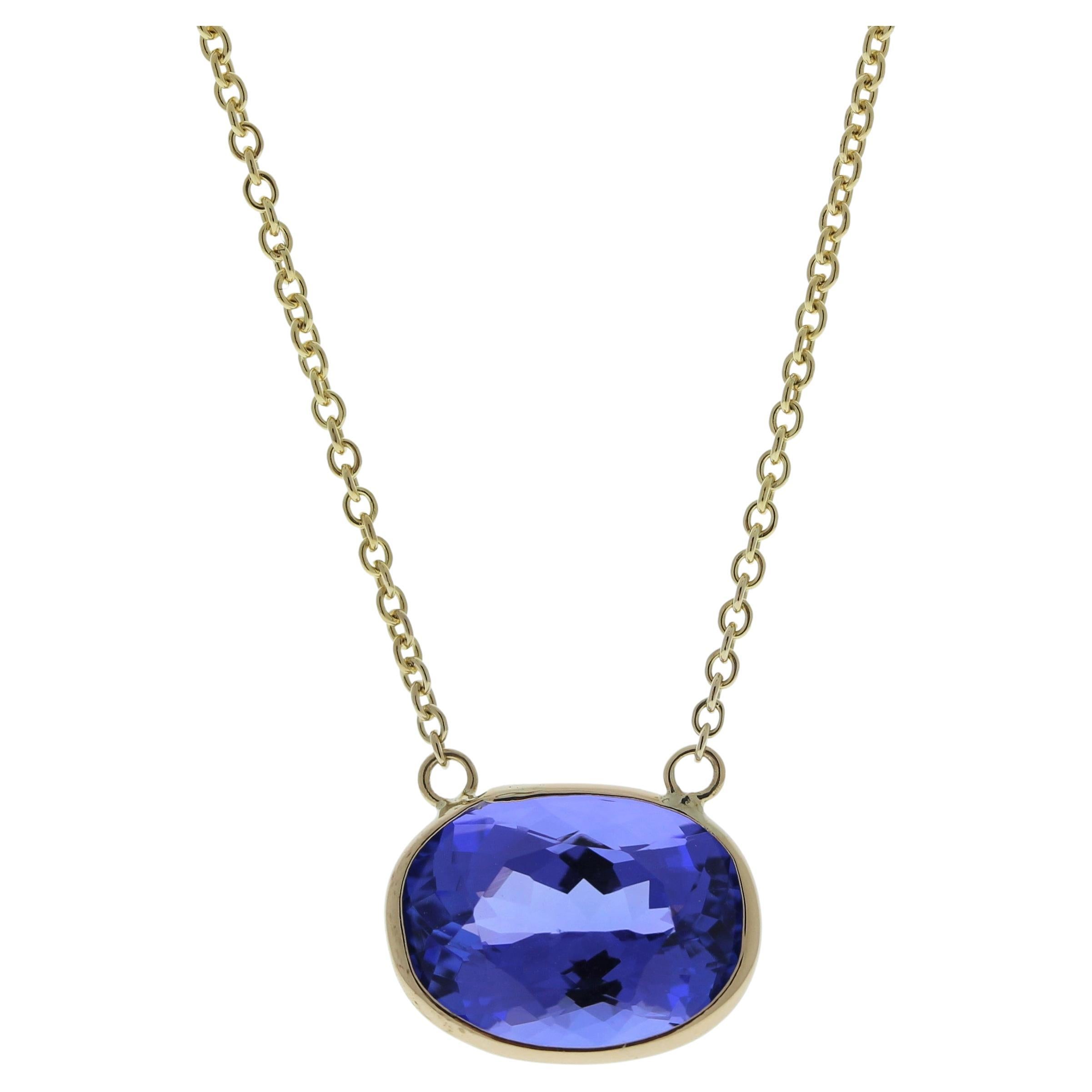 4.20 Carat Oval Tanzanite Blue Fashion Necklaces In 14k Yellow Gold For Sale