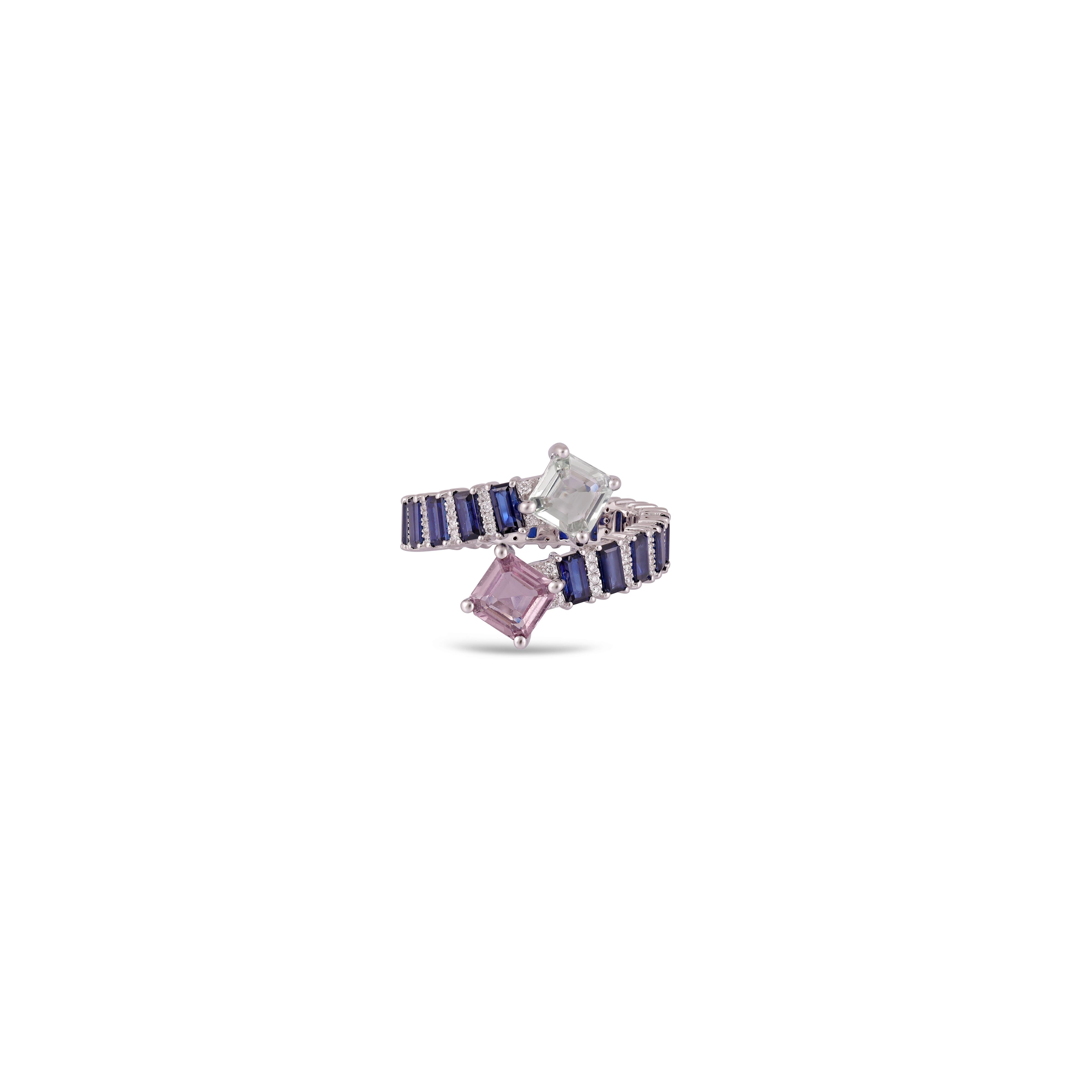 This is an elegant Sapphire & diamond ring studded in 18k gold with 2 piece of  Sapphire weight 1.68 Carat, 19 piece of Sapphire 2.52 carat. which is surrounded of 72 mix shaped diamonds weight 0.22 carat with this entire ring studded in 18k gold 

