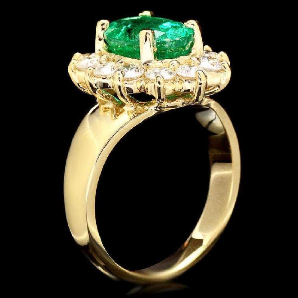 4.20 Carats Natural Emerald and Diamond 14K Solid Yellow Gold Ring

Total Natural Green Emerald Weight is: Approx. 3.00 Carats

Emerald Measures: Approx. 10.00 x 8.00mm

Natural Round Diamonds Weight: Approx. 1.20 Carats (color G-H / Clarity