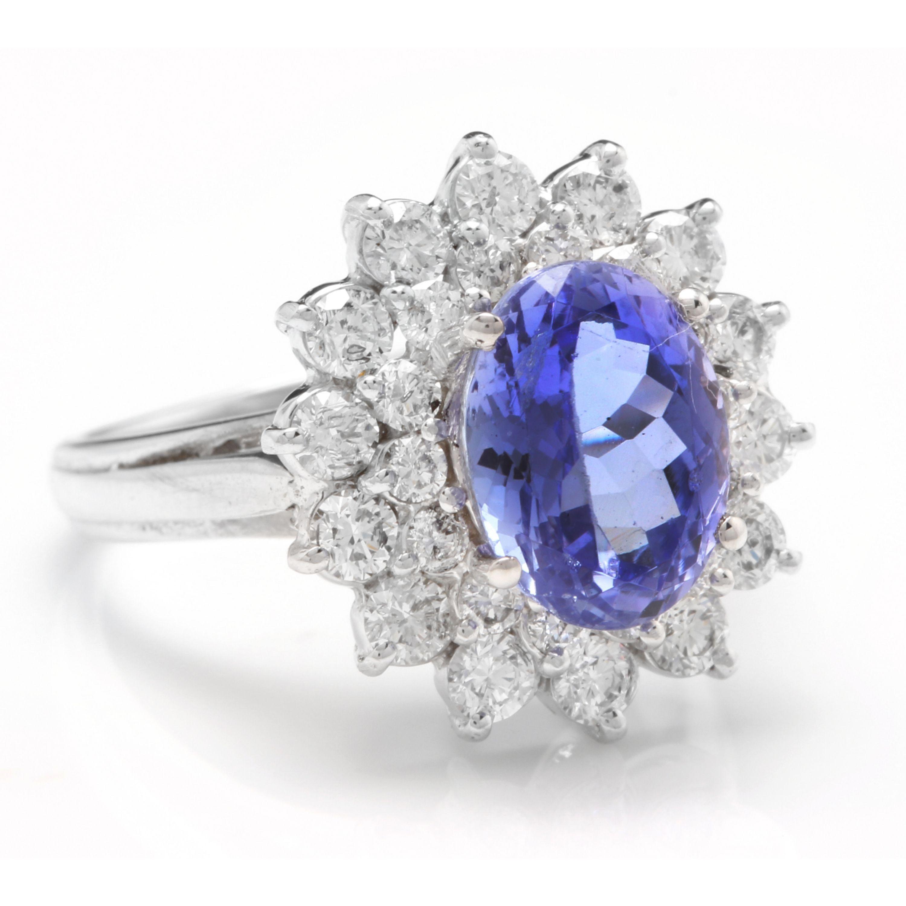 4.20 Carats Natural Very Nice Looking Tanzanite and Diamond 14K Solid White Gold Ring

Total Natural Oval Cut Tanzanite Weight is Approx. 3.05 Carats

Tanzanite Measures: Approx. 10.00 x 8.00mm

Natural Round Diamonds Weight: Approx. 1.15 Carats