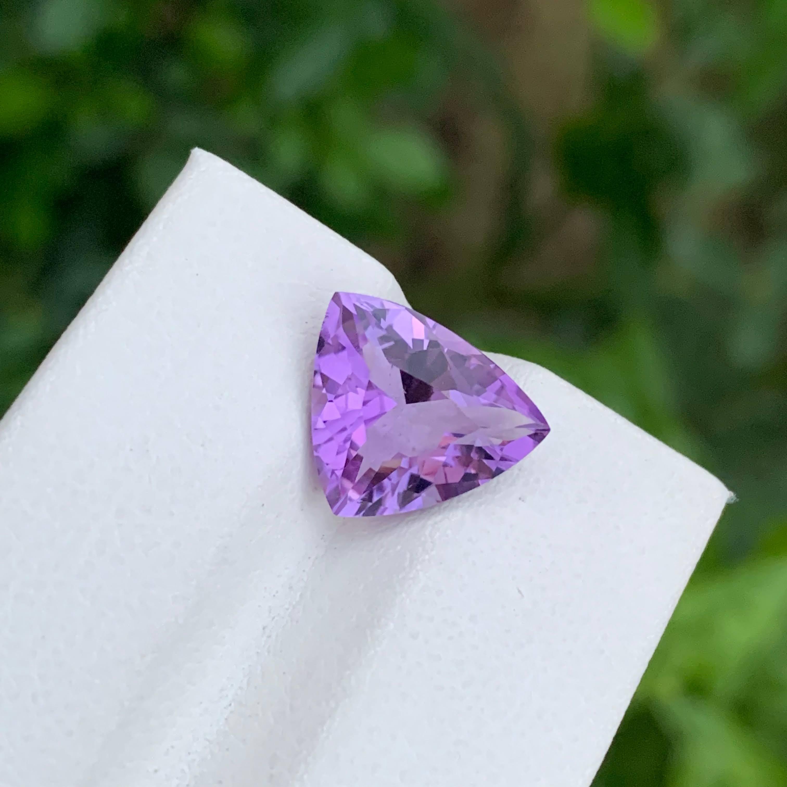Weight 4.20 carats 
Dimensions 12.9x11.1x6.8mm
Treatment none 
Origin Brazil 
Clarity VVS
Shape triangular
Cut trilliant 



This exquisite 4.20 carat purple amethyst stone showcases a stunning trilliant cut, enhancing its natural beauty and