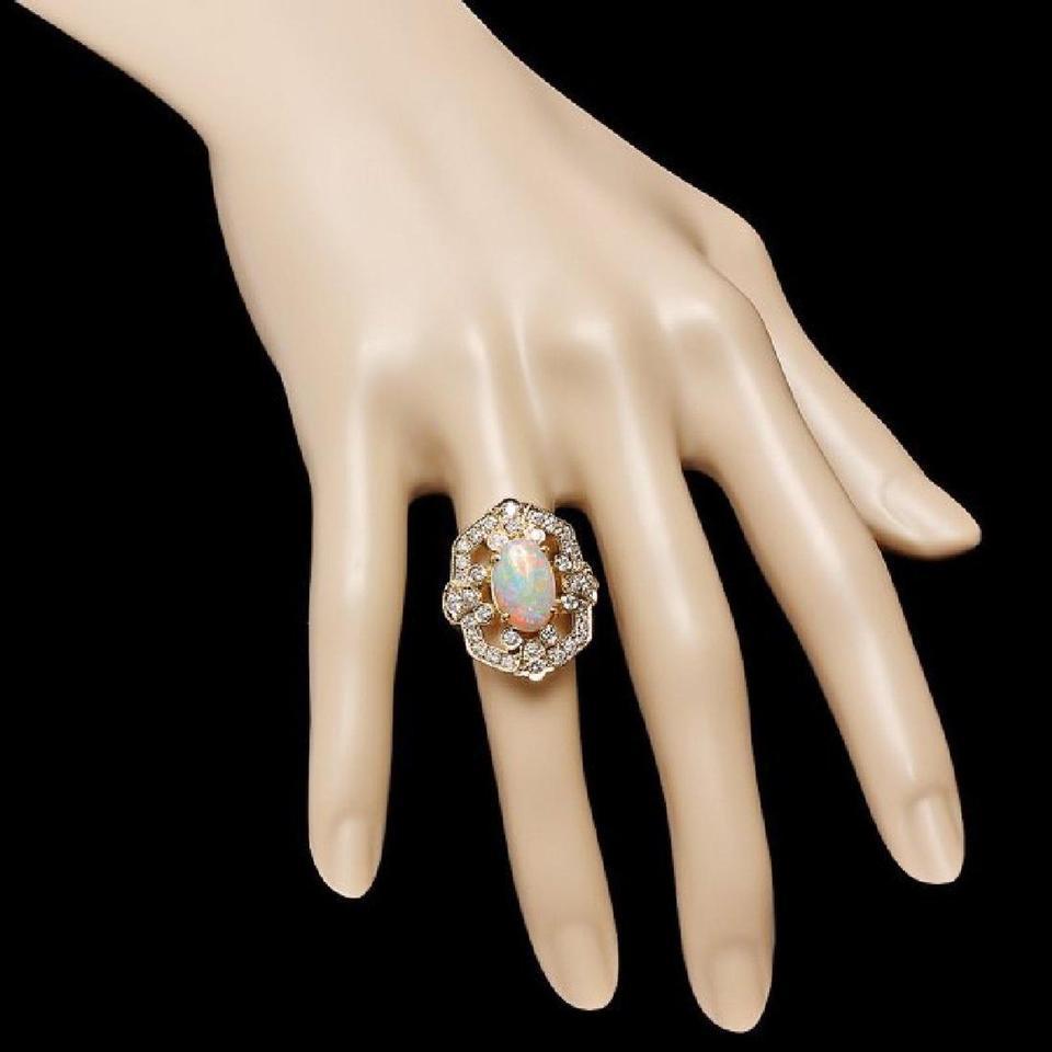 Mixed Cut 4.20 Ct Natural Impressive Ethiopian Opal and Diamond 14 Karat Solid Gold Ring For Sale