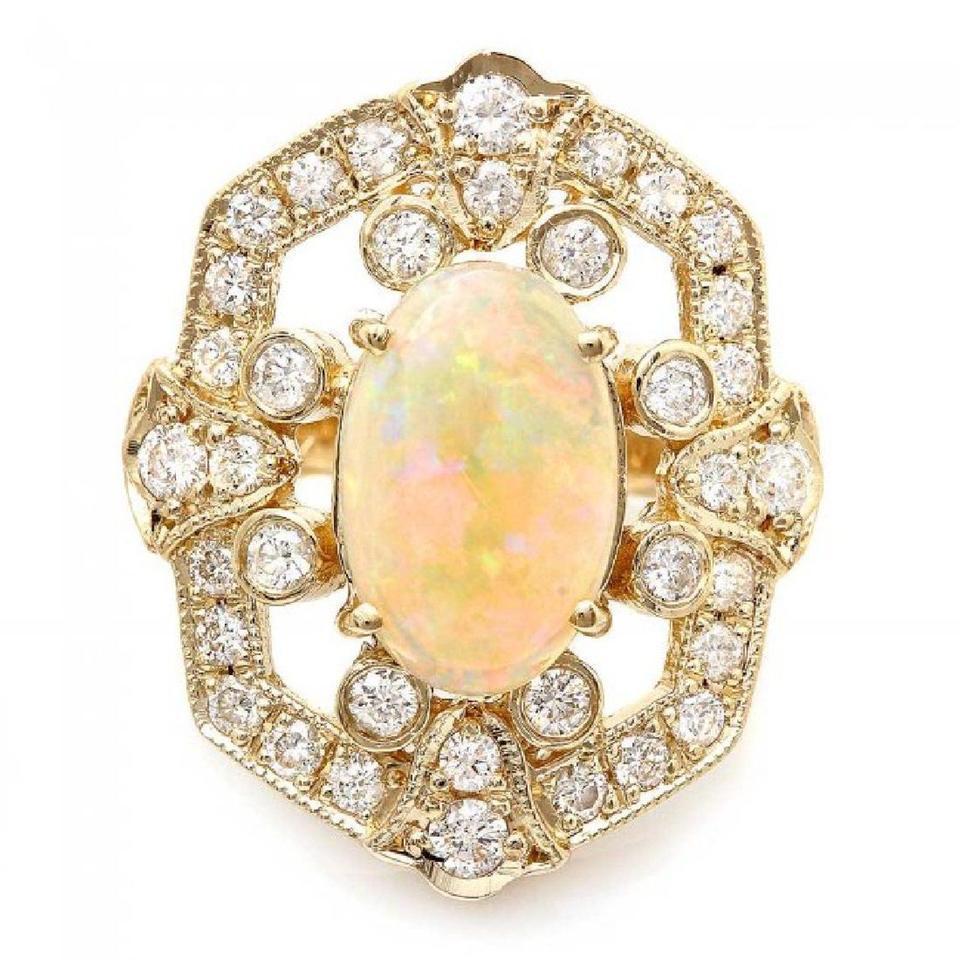 4.20 Ct Natural Impressive Ethiopian Opal and Diamond 14 Karat Solid Gold Ring In New Condition For Sale In Los Angeles, CA