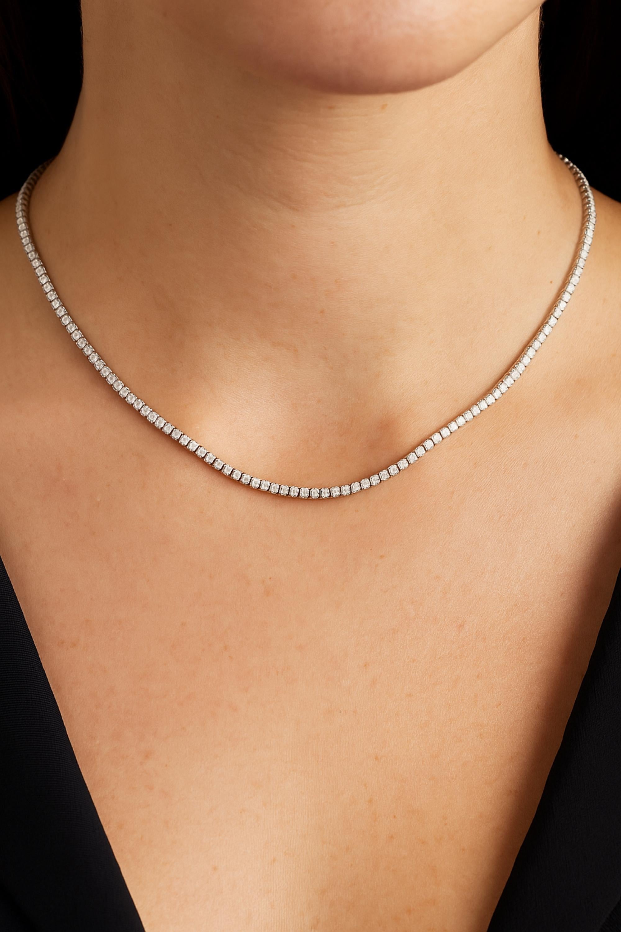 4,20 Karat SI/H Naturdiamant Tennis abgestufte Hochzeitskette 14k Weißgold
Diese Tenniskette besteht aus einer durchgehenden Reihe fein geschliffener runder Steine, die präzise gefasst wurden, um nahtloses Funkeln und Symmetrie zu gewährleisten. Der