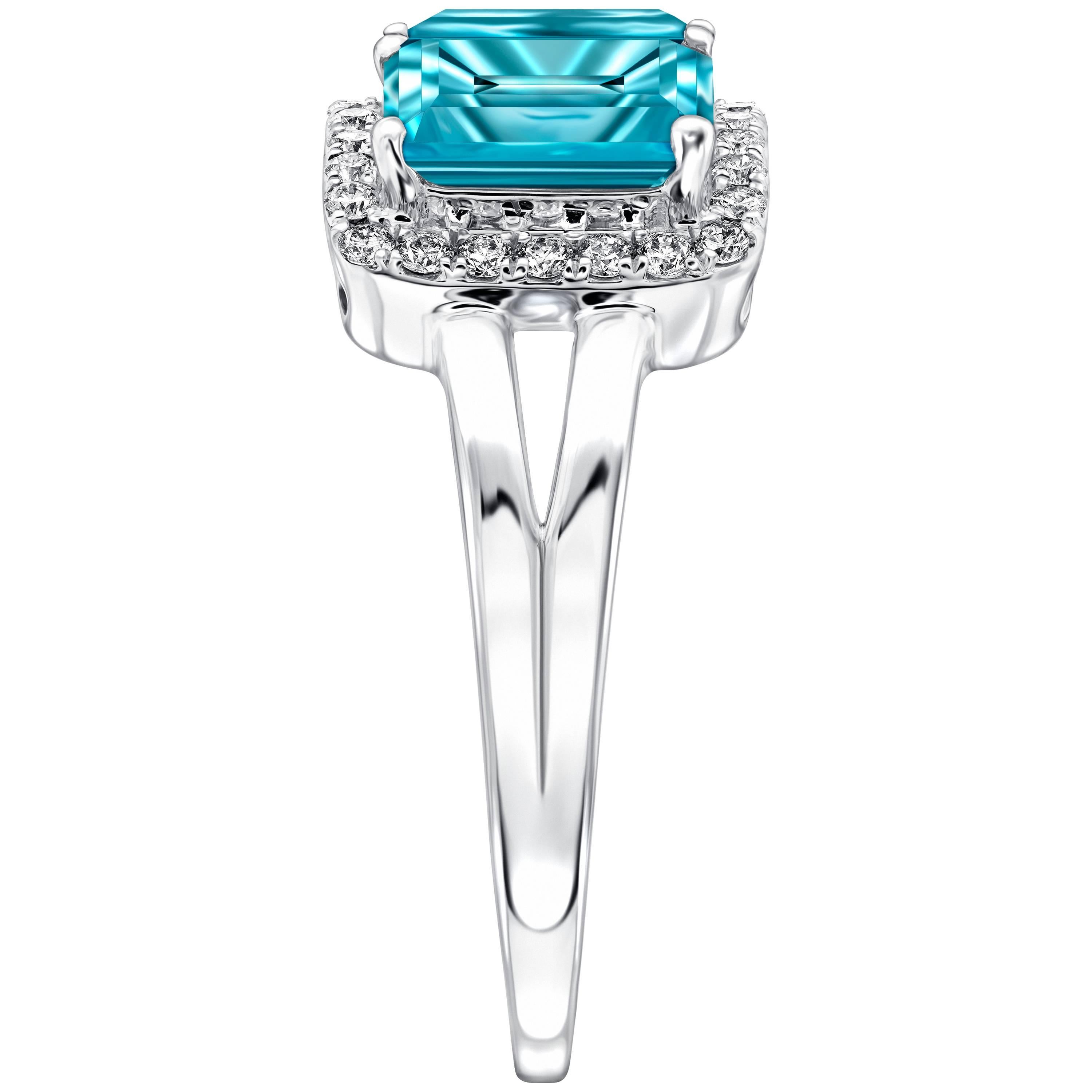 4.08 Carat Emerald Cut Blue Topaz Diamond Halo 18 KT White Gold Engagement Ring In New Condition For Sale In London, GB