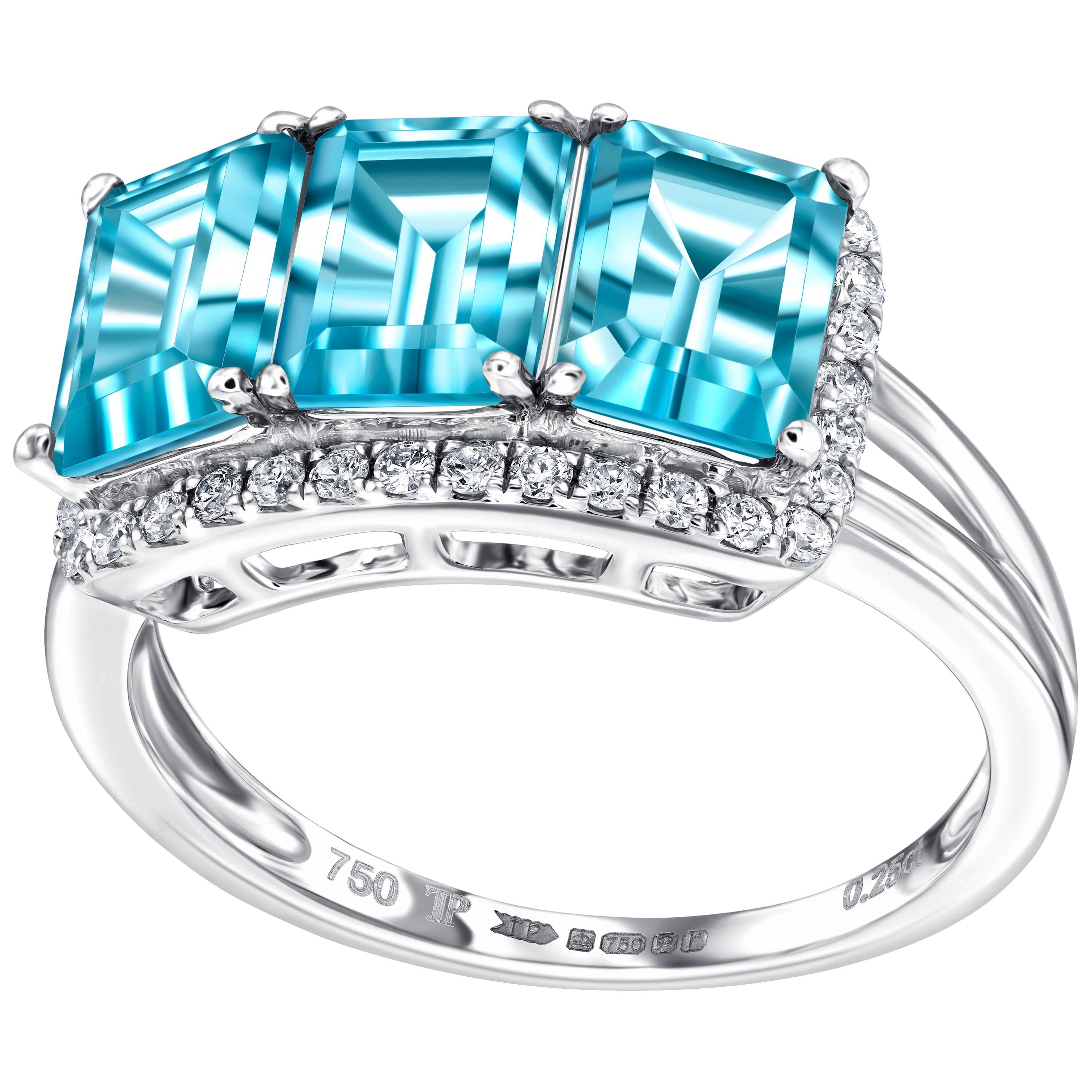 Bague de fiançailles en or blanc 18 KT avec halo de diamants et topaze bleue taille émeraude de 4,08 carats